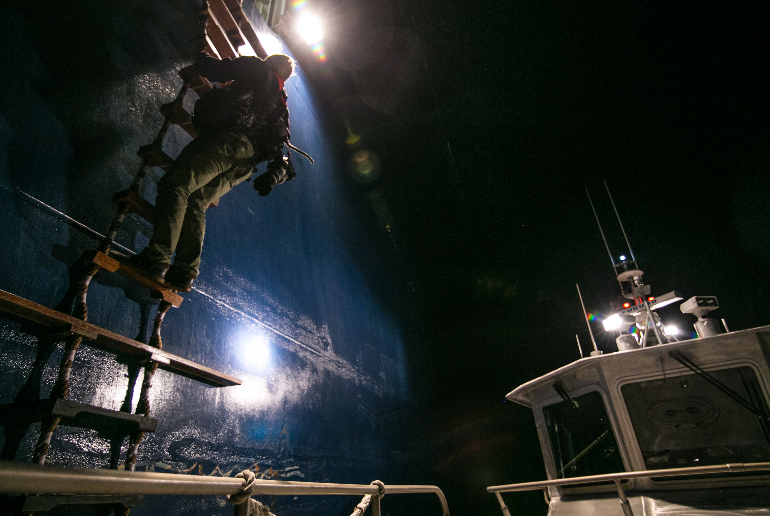 Me climbing about the car carrying ship Heroic Leader outside of Boston Harbor early on Aug. 23. Photo by Mike Schwarz