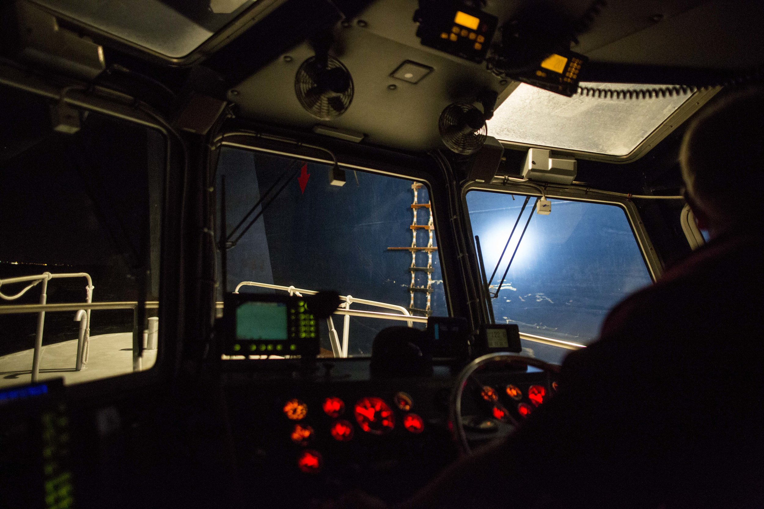  Pilot Boat Captain Shawn Kelly pulls alongside the car carrying ship Heroic Leader as they both continue moving at around 15mph outside of Boston Harbor on Aug. 23. 