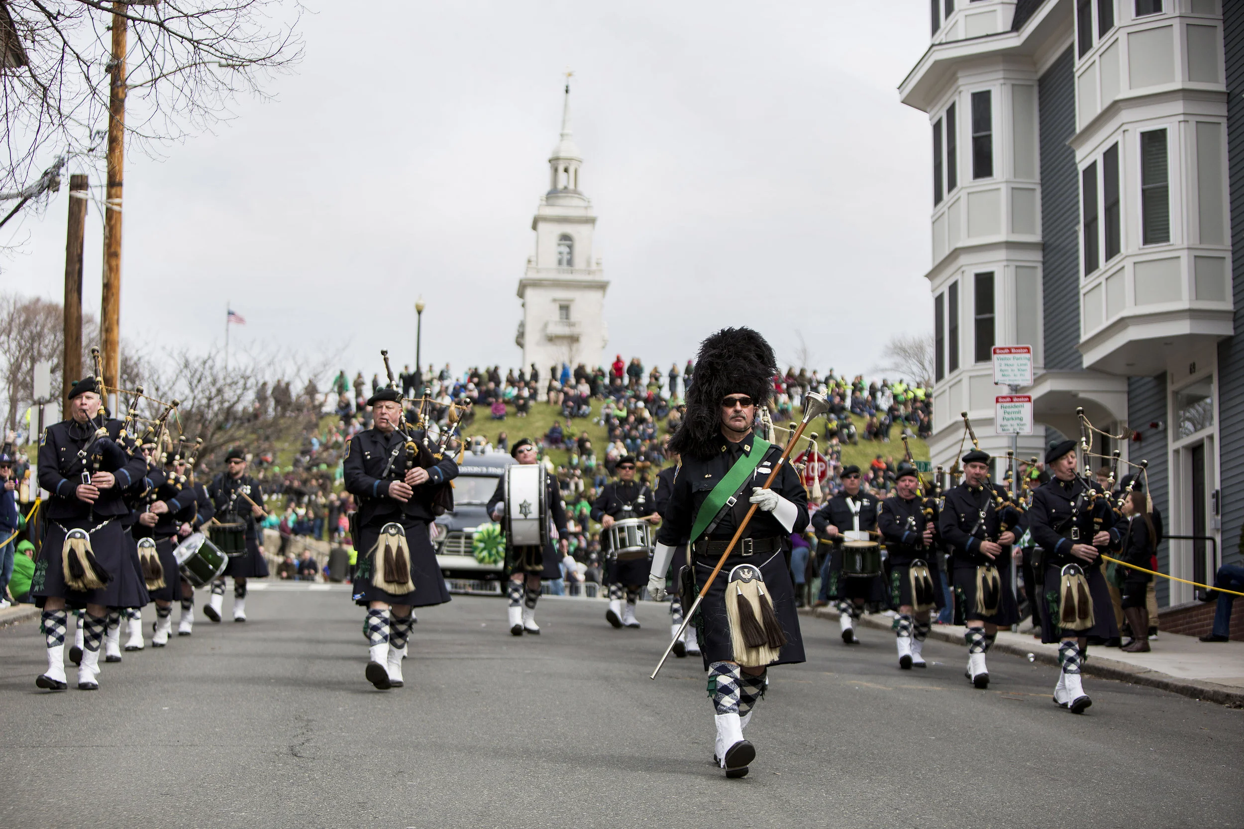 BOSTON, MA - MARCH 20: The Boston Police Gaelic Column of Pipes and Drums walks down from Dorchester Heights during the annual South Boston St. Patrick's Parade passes on March 20, 2016 in Boston, Massachusetts. According to parade organizers, the South Boston St. Patrick's Parade is listed as the second longest parade in the country. 