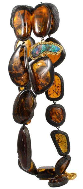   K Brunini insect and vegetable matter specimen amber necklace with Australian opal and fancy yellow diamonds. Price upon request.&nbsp;  