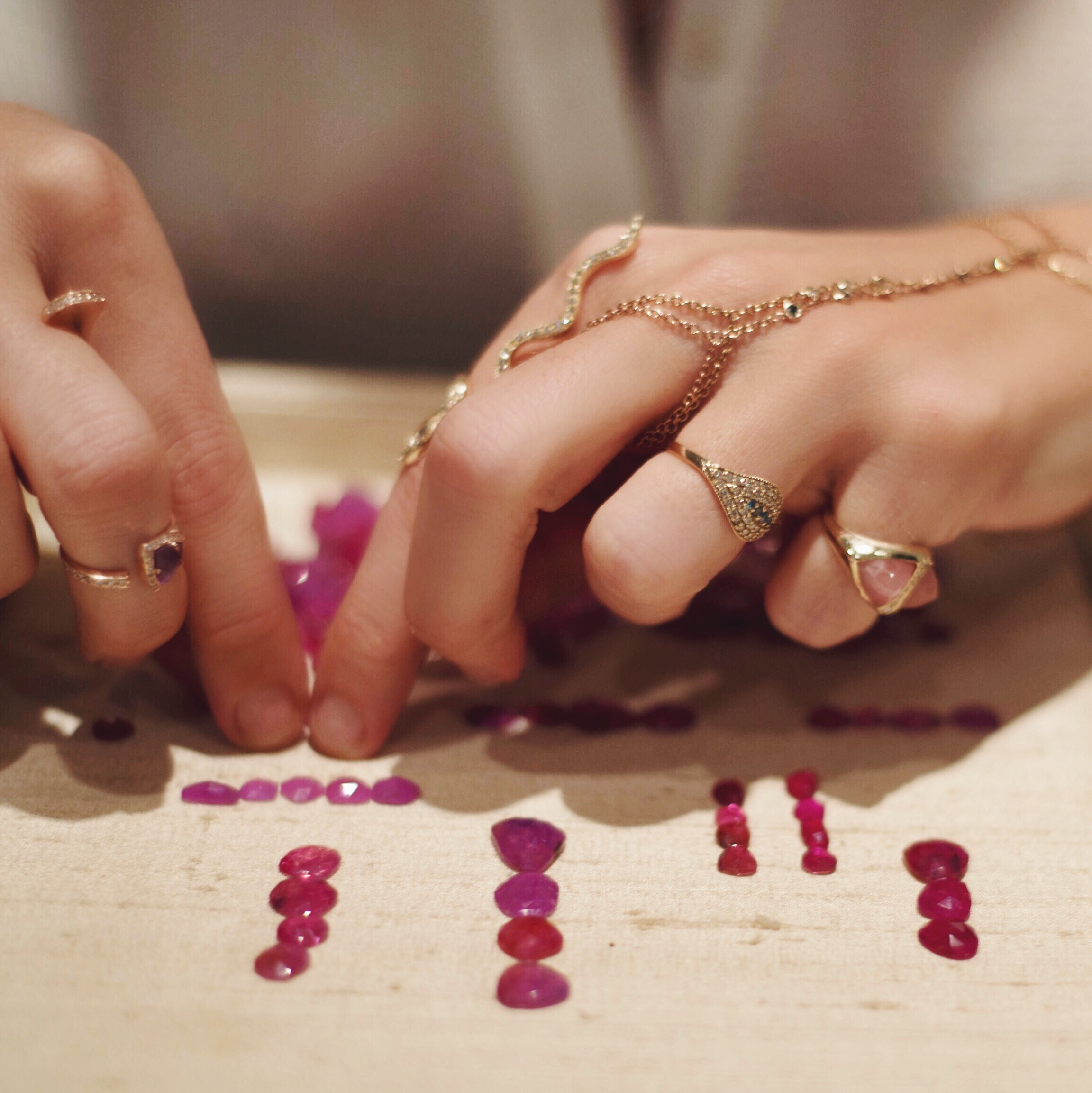  Jacquie's favorite pasttime: sorting through colorful gemstones to get inspired.&nbsp; 