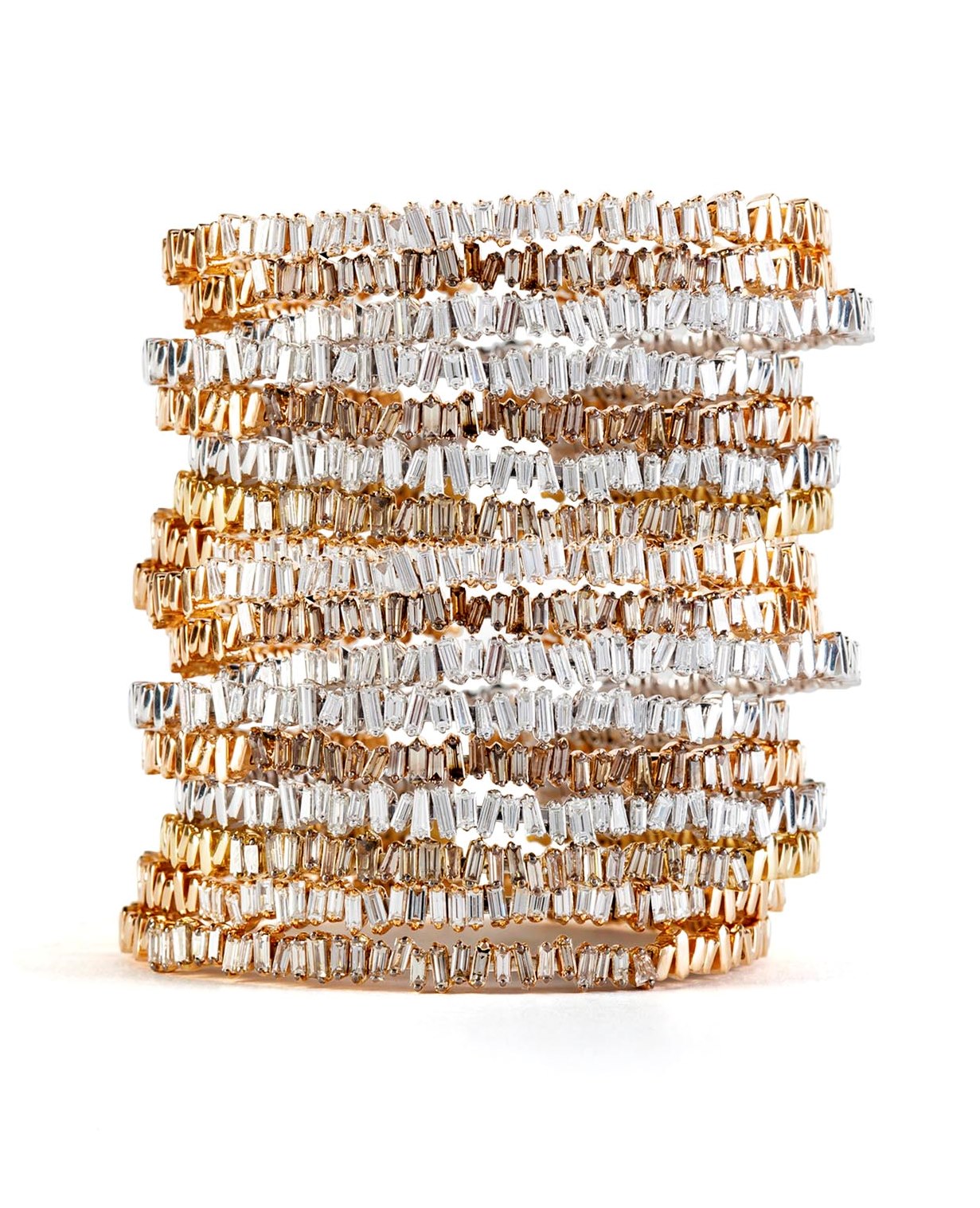 Baguette Bangles in 18-karat gold and diamonds.