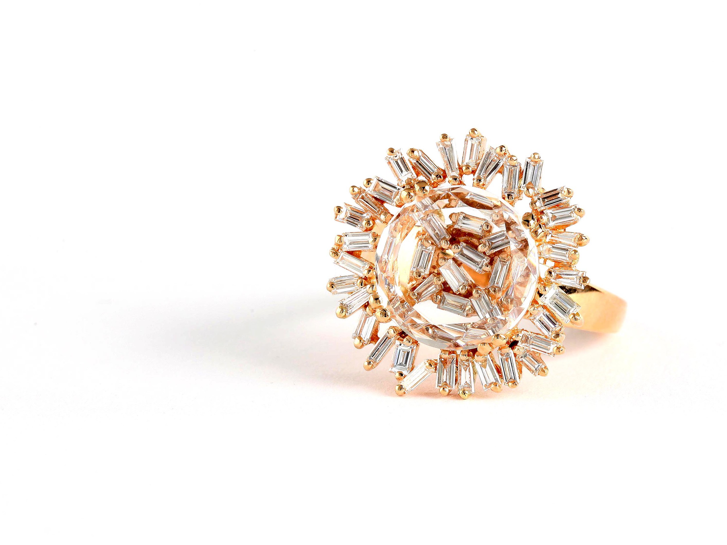 18-karat gold and diamond ring. 
