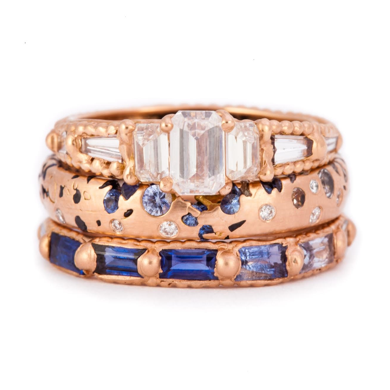   An example of one of Polly's favorite color combinations: rose gold and blue sapphires.  