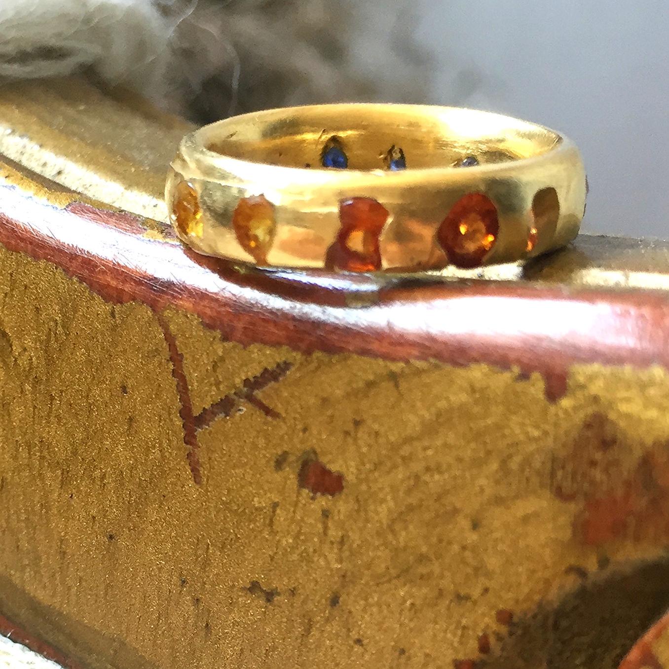   Detail shot of direct cast orange and yellow sapphires.  