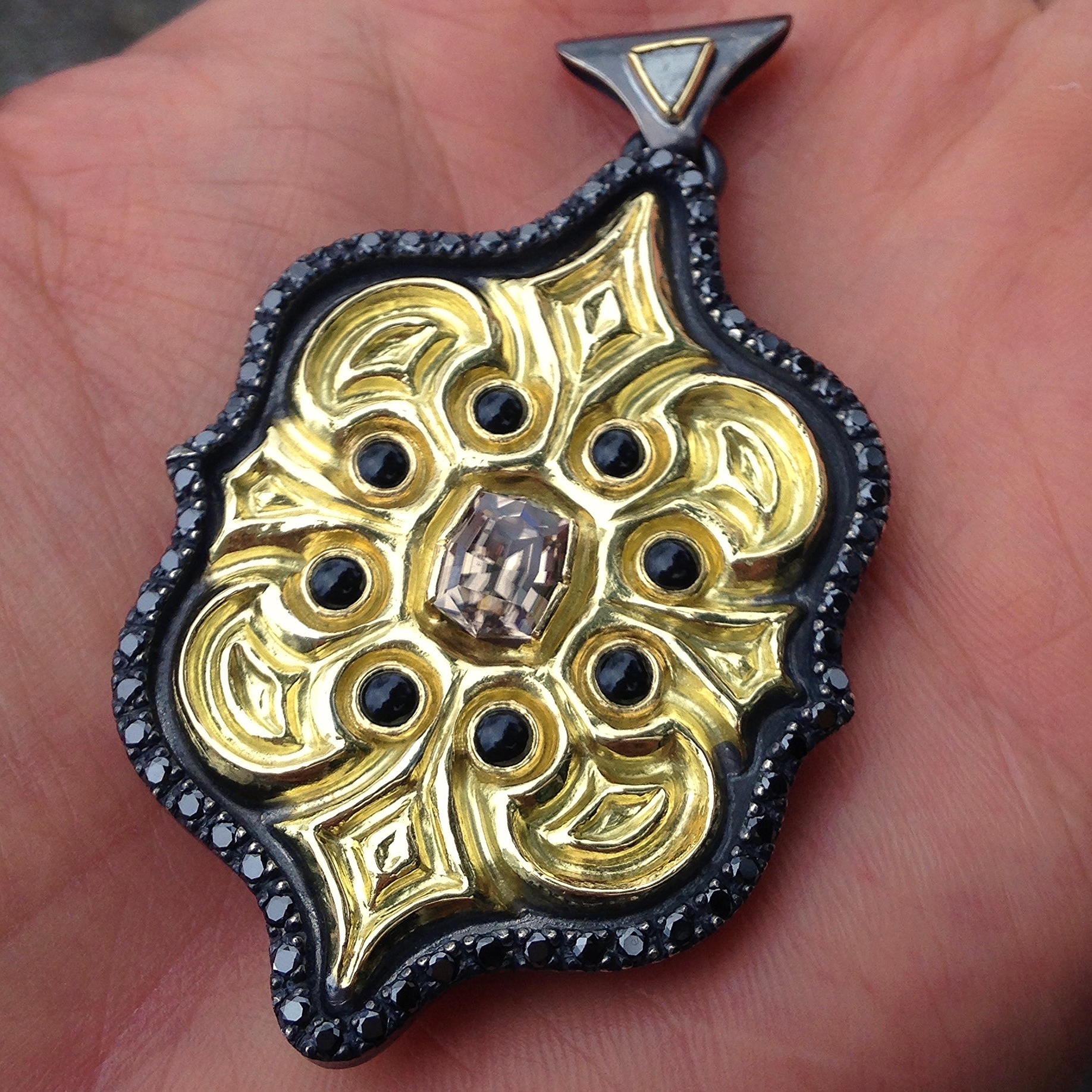    'Stella Aranea', masterfully hand-crafted by&nbsp;Jarex Schmidt&nbsp;of  Gods Jewels  in&nbsp;Oakland CA.&nbsp;      &nbsp;Silver &amp;&nbsp;18K yellow gold, featuring a Top Notch&nbsp;Nigerian zircon.     &nbsp; Black Jade, Black Diamonds and Raw