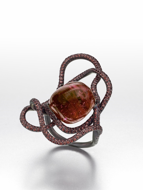  "The Lady in Red" ring in titanium with a&nbsp;35.89 carat Birman cabochon spinel and pink sapphires.&nbsp; 