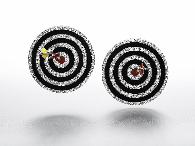 "Hit the Bullseye" earrings in enamel, white gold, pink gold and silver with diamonds. 