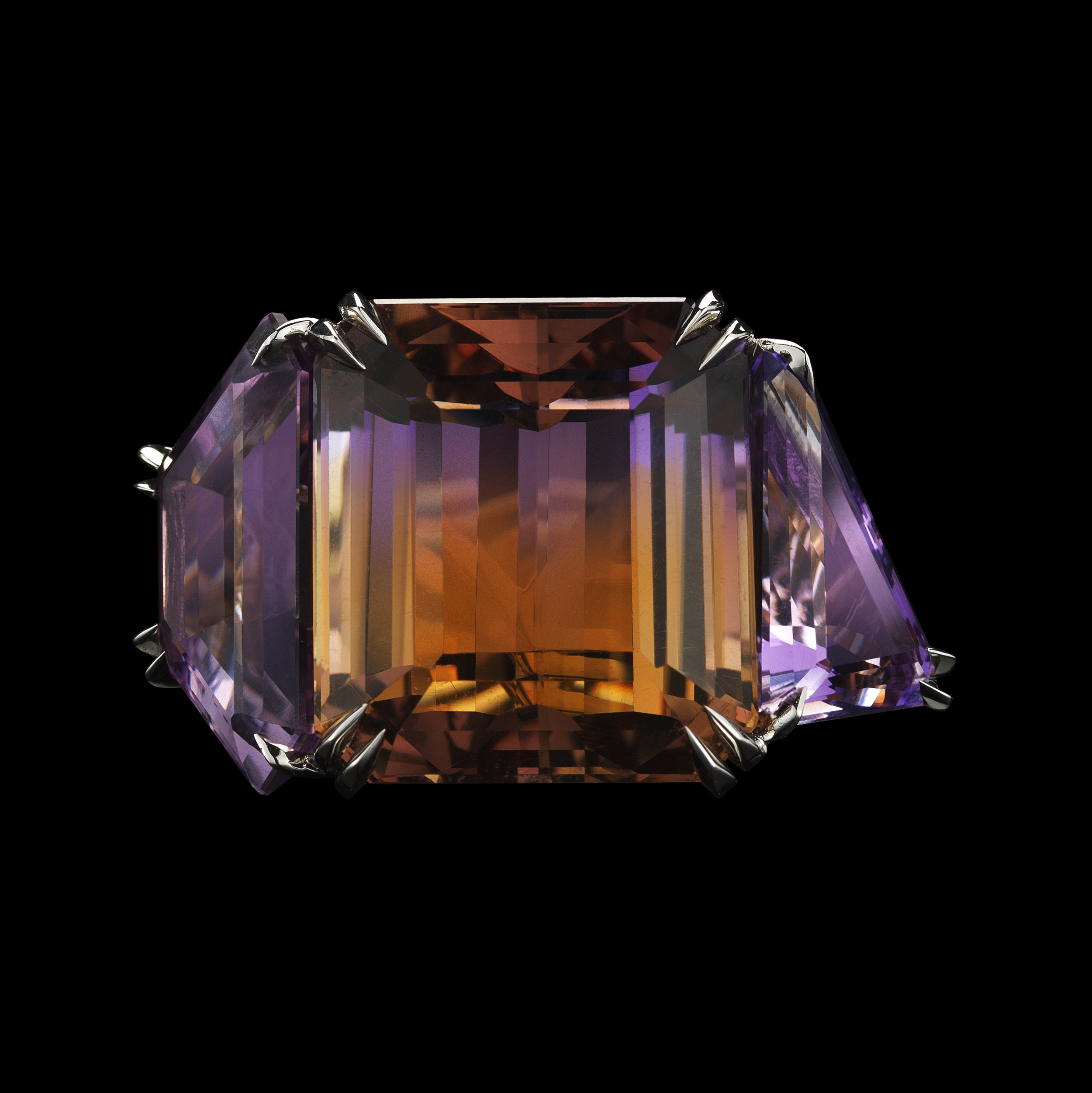 Asymmetrical and bicolor Amertrine and diamond three stone ring. 