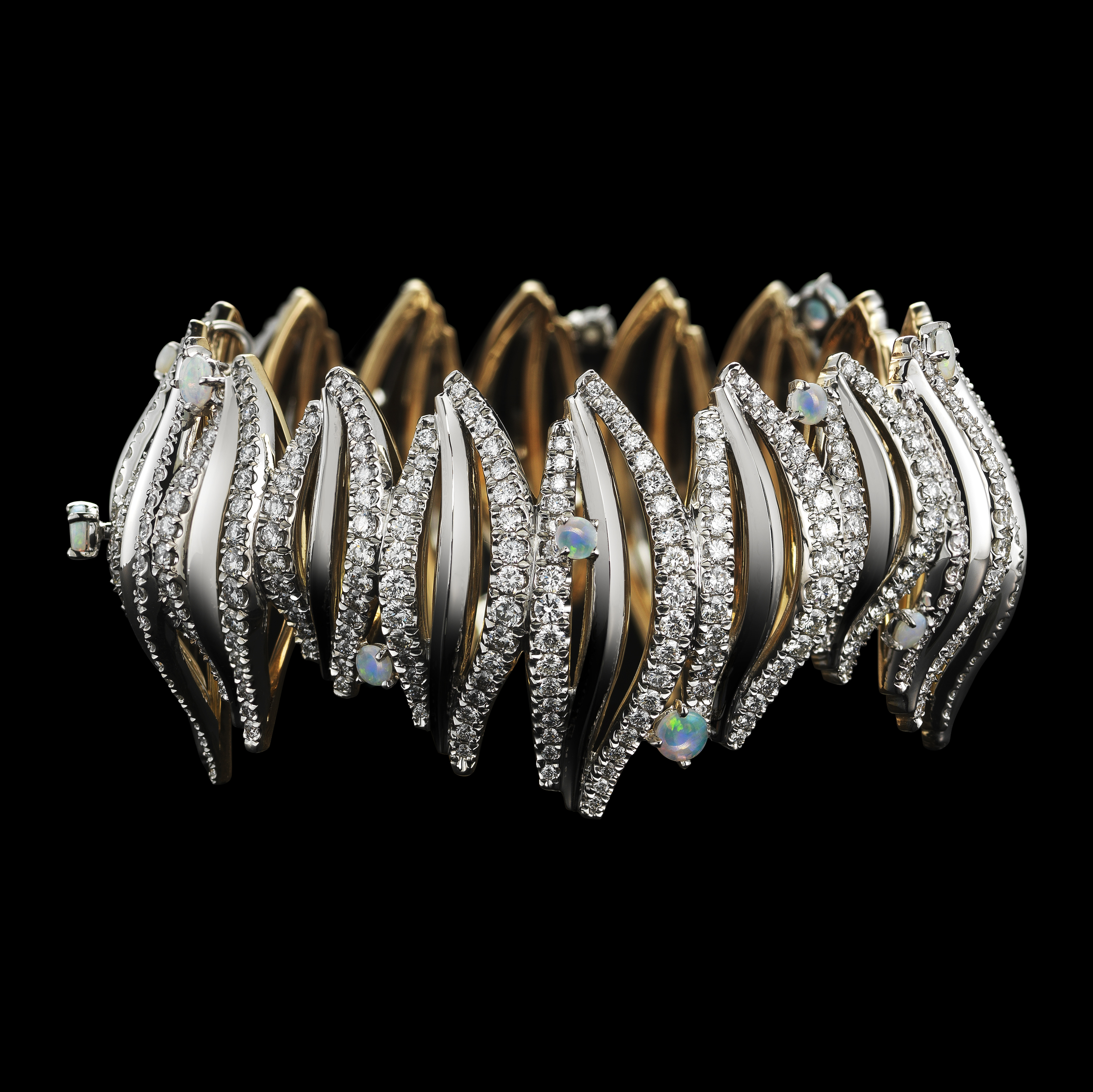  Branch diamond cuff with opal cabochons.&nbsp; 