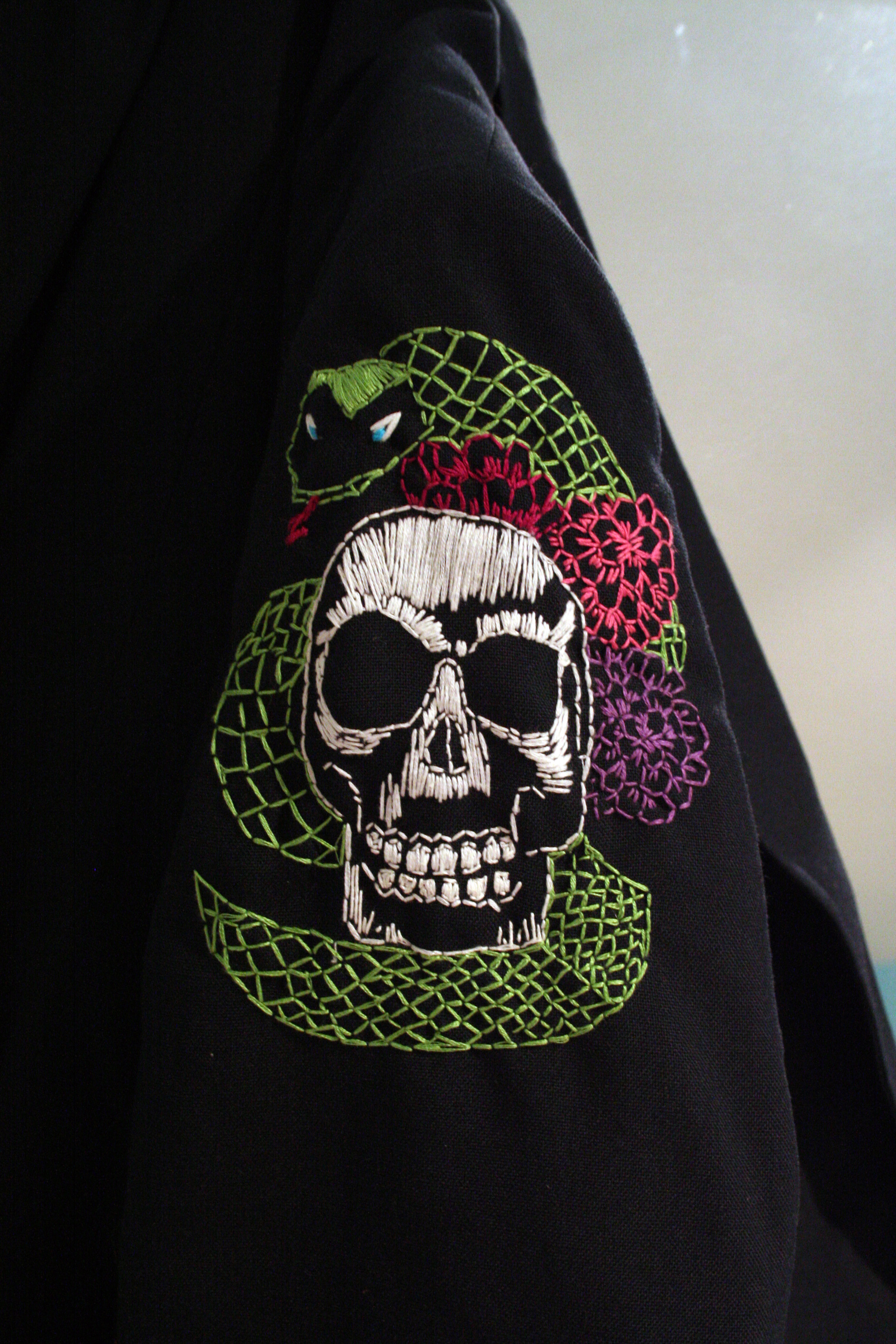 Another of her many talents – embroidery on a jacket. 