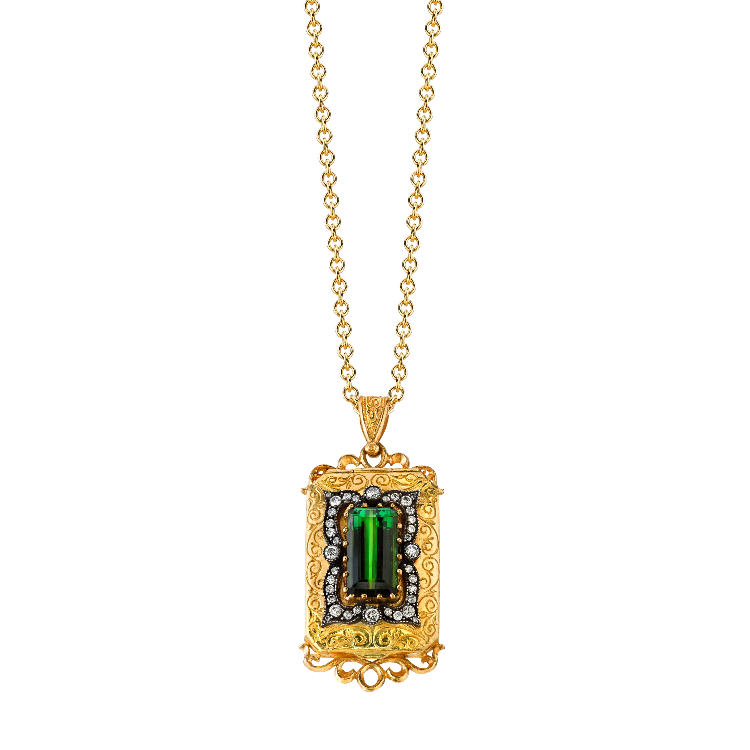  22K and silver locket with green tourmaline and diamonds, $16,500.&nbsp; 