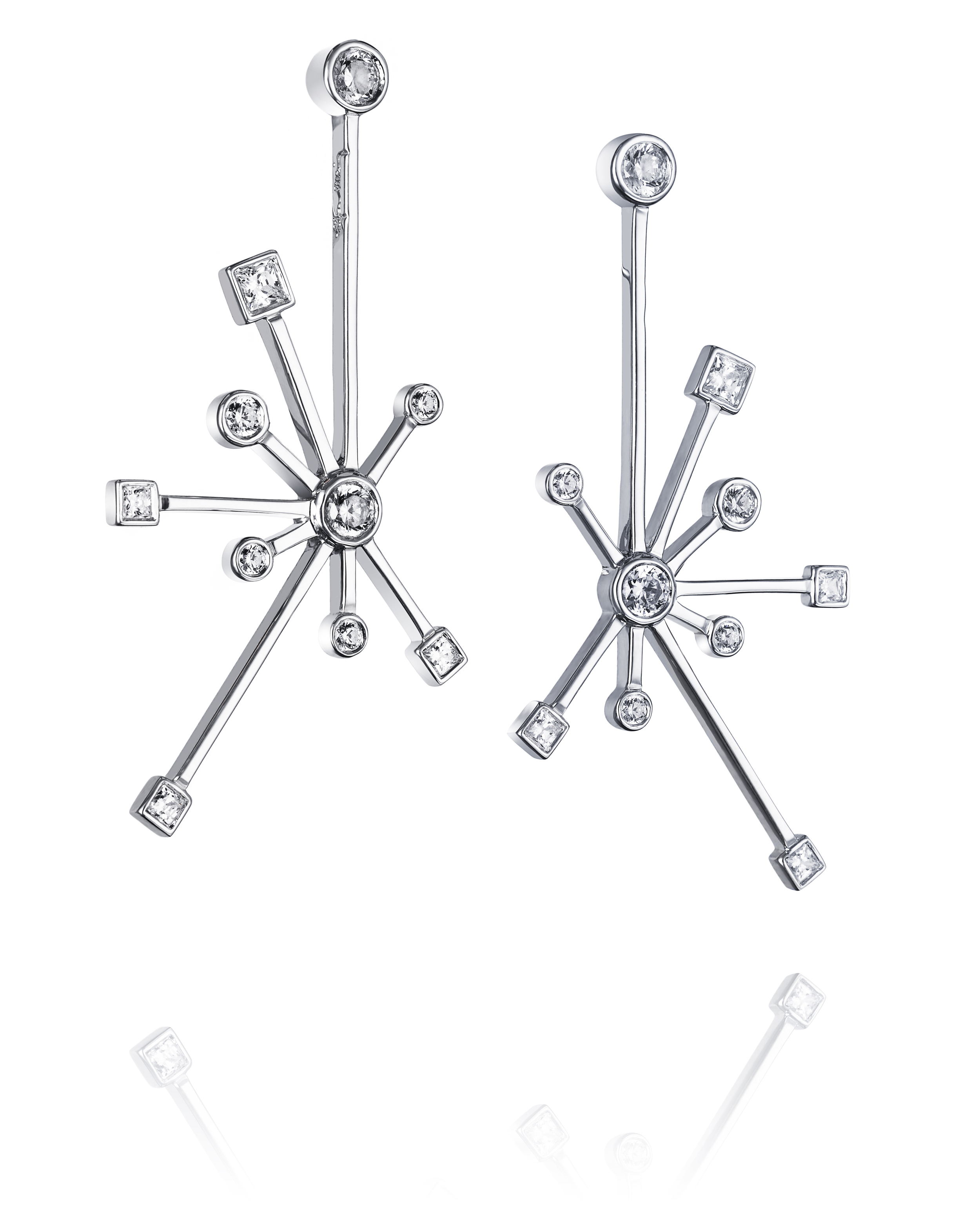  Kaboom earrings in 18k white gold with princess and brilliant cut diamonds in various sizes, $8,500,  available at Efva Attling .&nbsp; 