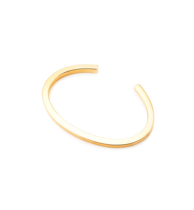 The brand's signature cuff bracelet in 18k gold. So chic. $5,970, available at Efva Attling . 
