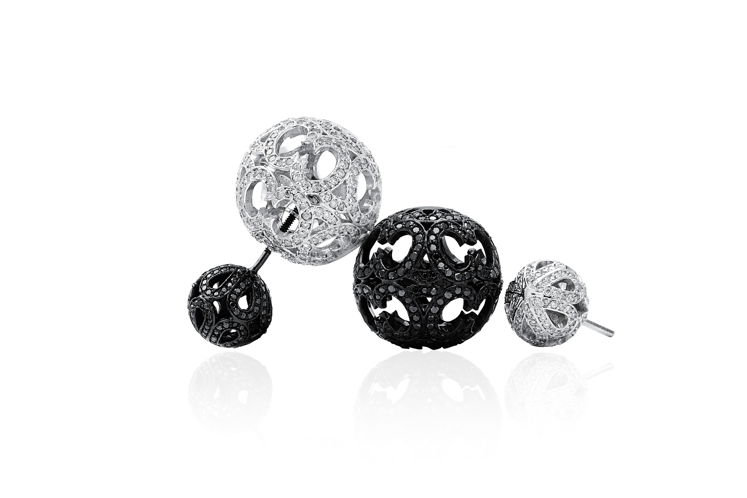  Also brand new from "Entwined with You" – black and&nbsp;white diamond double ball earrings. 