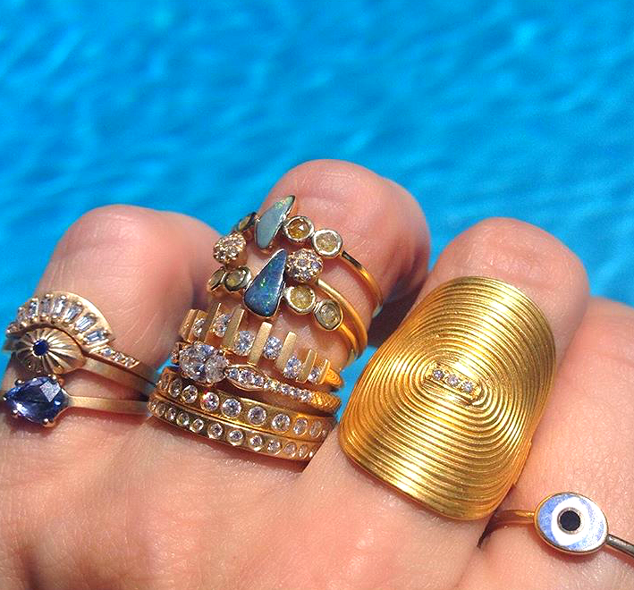   A cluster of MUSE designers, including the lust-worthy Yossi 'vinyl' ring on Jennifer's middle finger.  