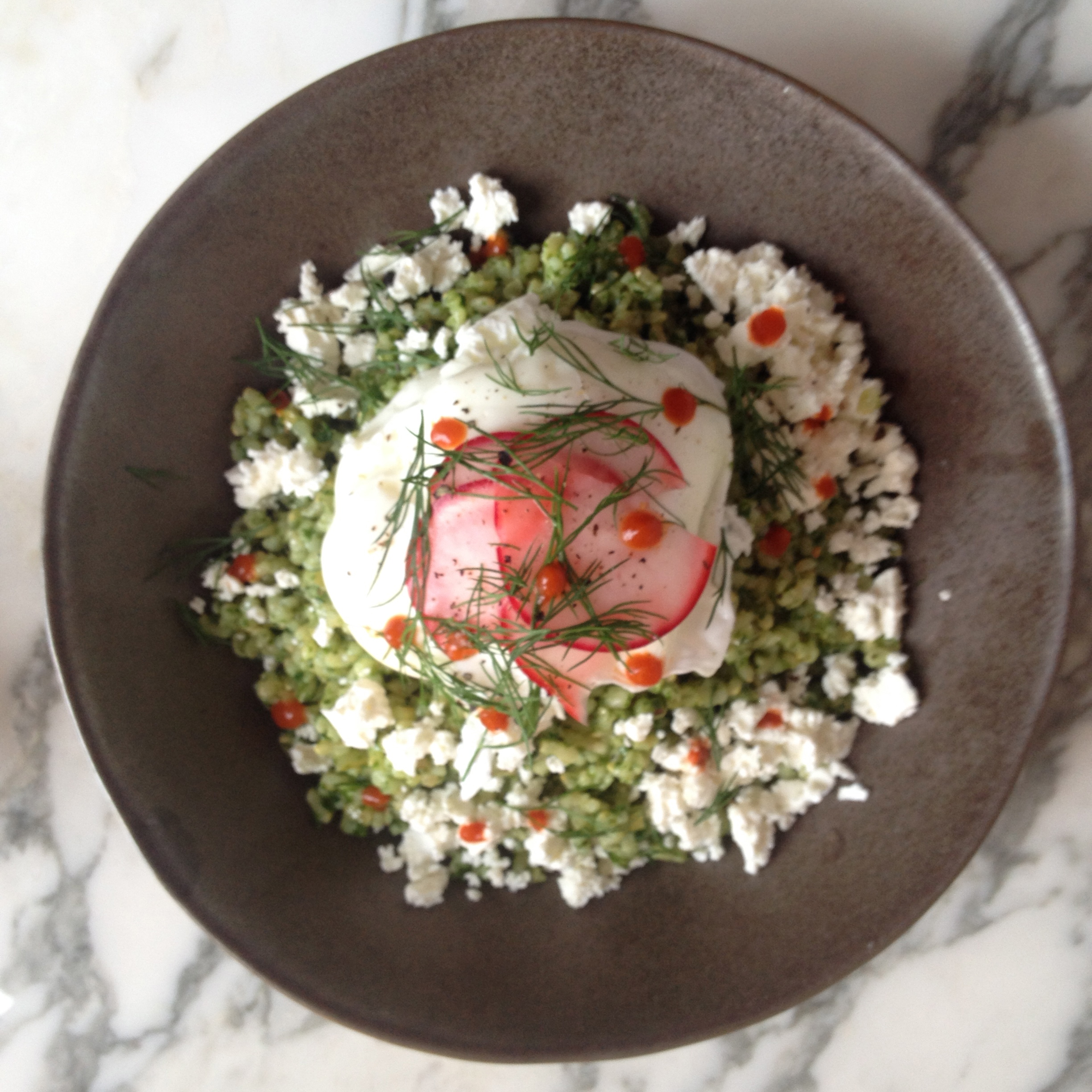 Sorrel infused rice with a spicy poached egg on top. Talya makes this. We want this. 