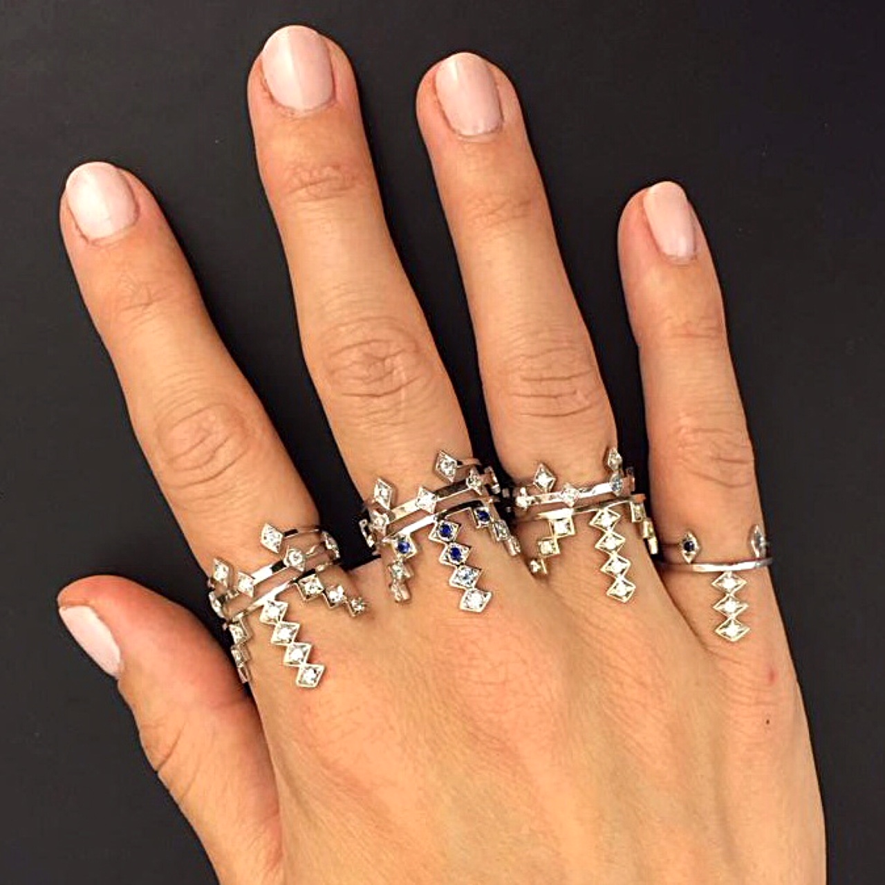 Baylee's hand bedazzled in AZLEE. Say that five times fast. 
