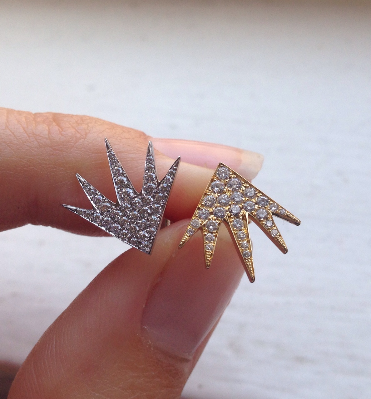 Fall 2015 studs in white and yellow 18K gold. 