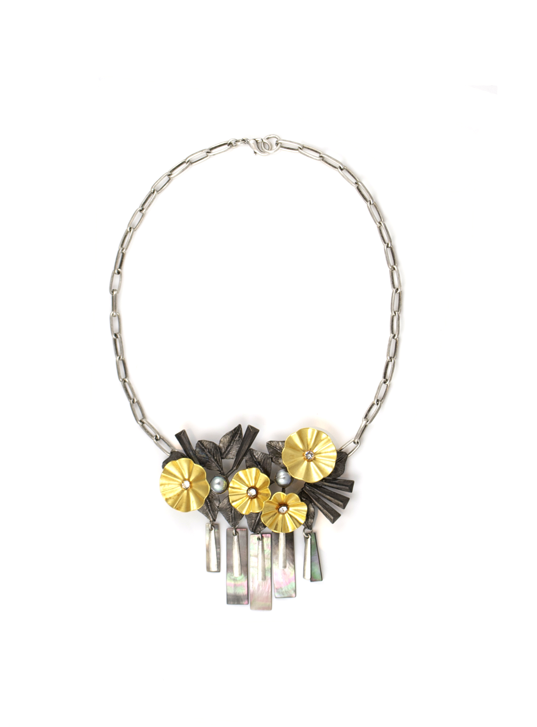  Flower Cloud necklace,  available at Gerard Yosca .&nbsp; 