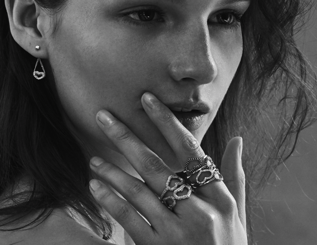  A model wearing Jordan's sentimental open heart rings.&nbsp; 