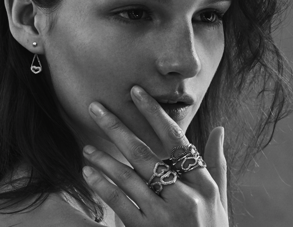 A model wearing Jordan's sentimental open heart rings. 