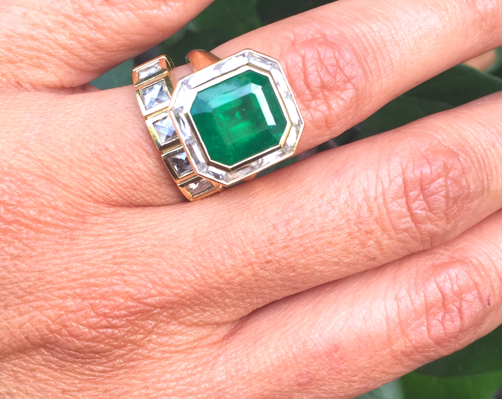   This fabulous emerald and baguette diamond ring was created for Corina by Ari and it makes us believe in love, OK?!  