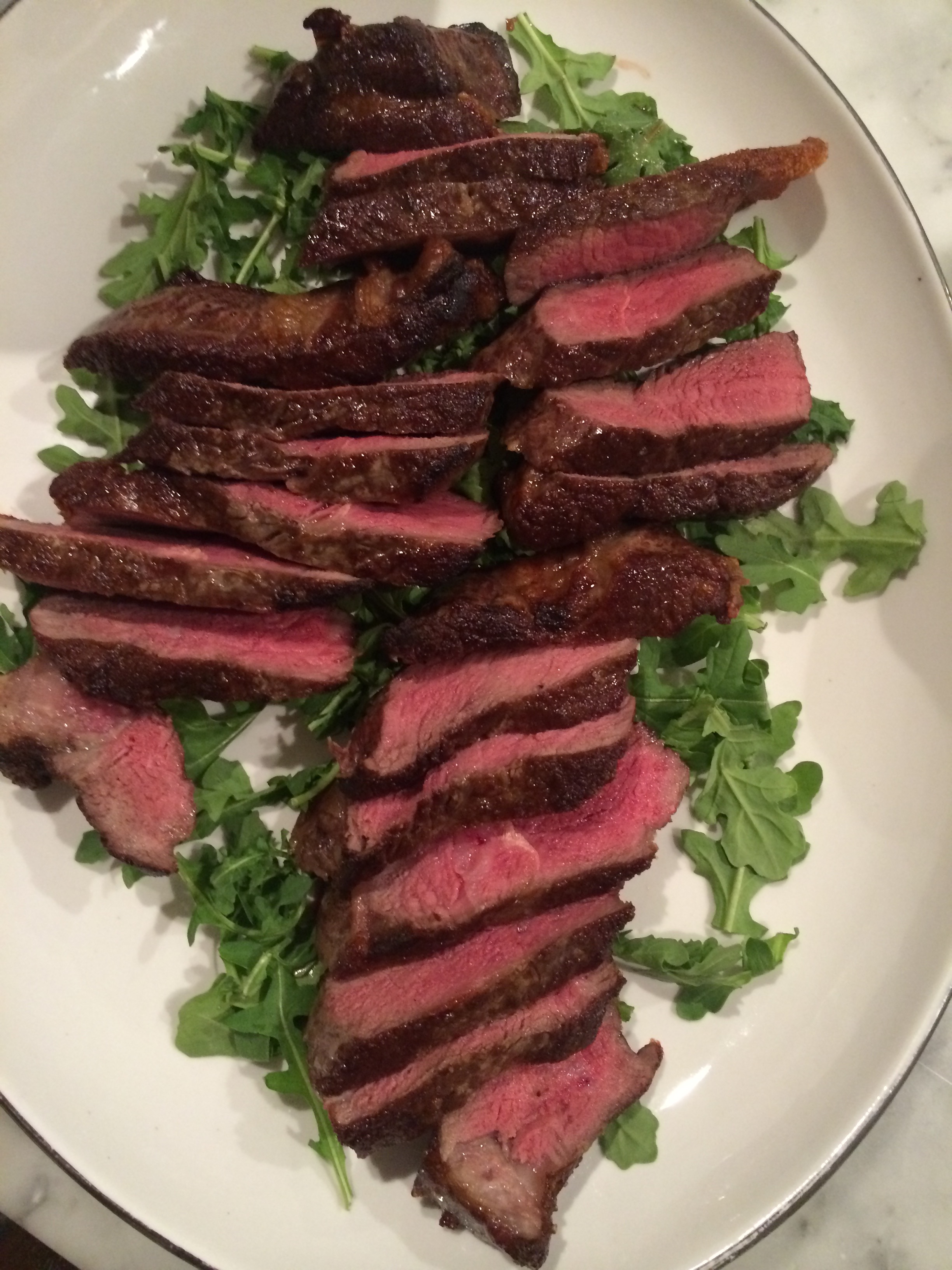 seared NY strips - family style
