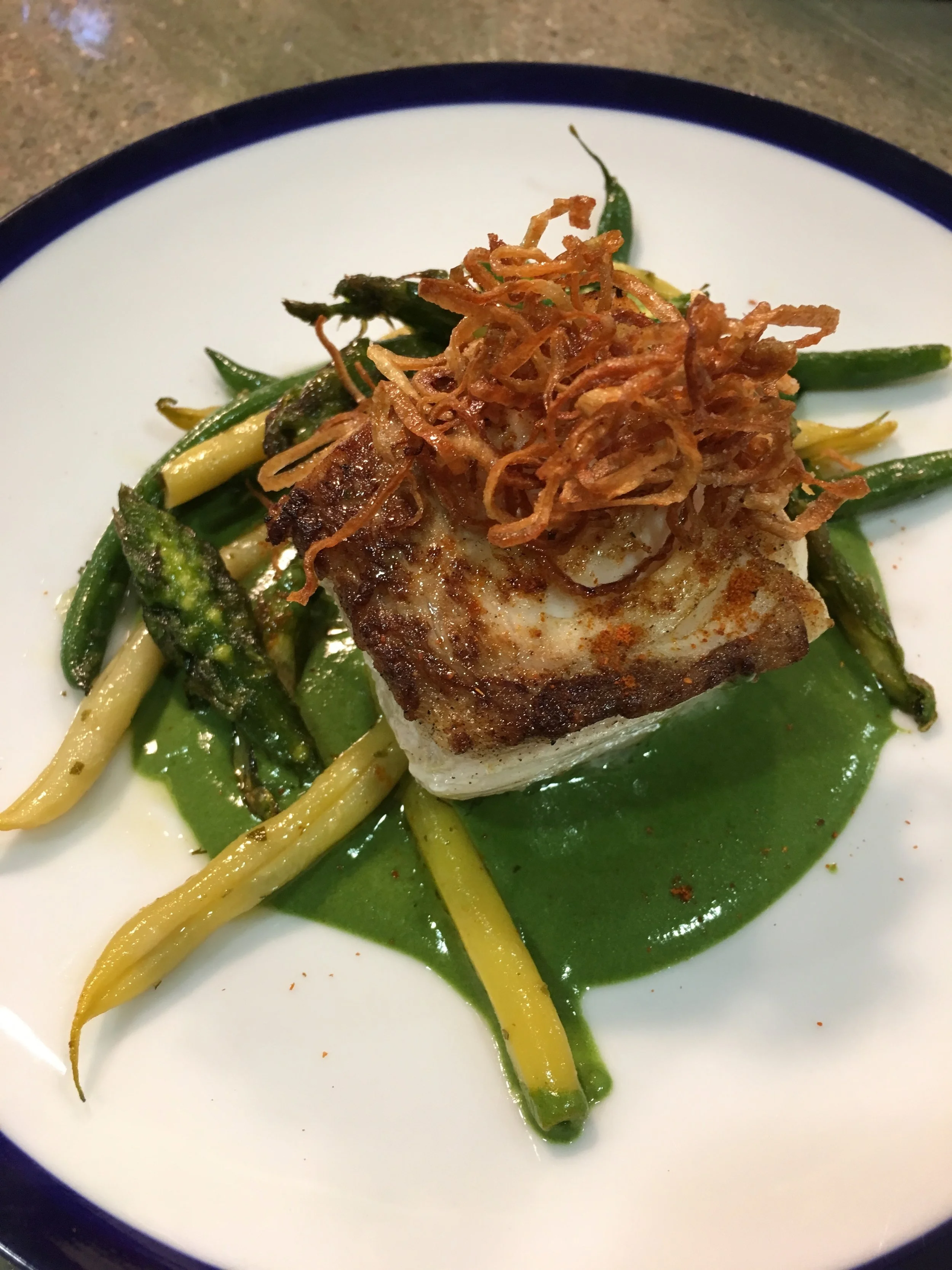 wild halibut with herbed haricot verts and spinach sauce