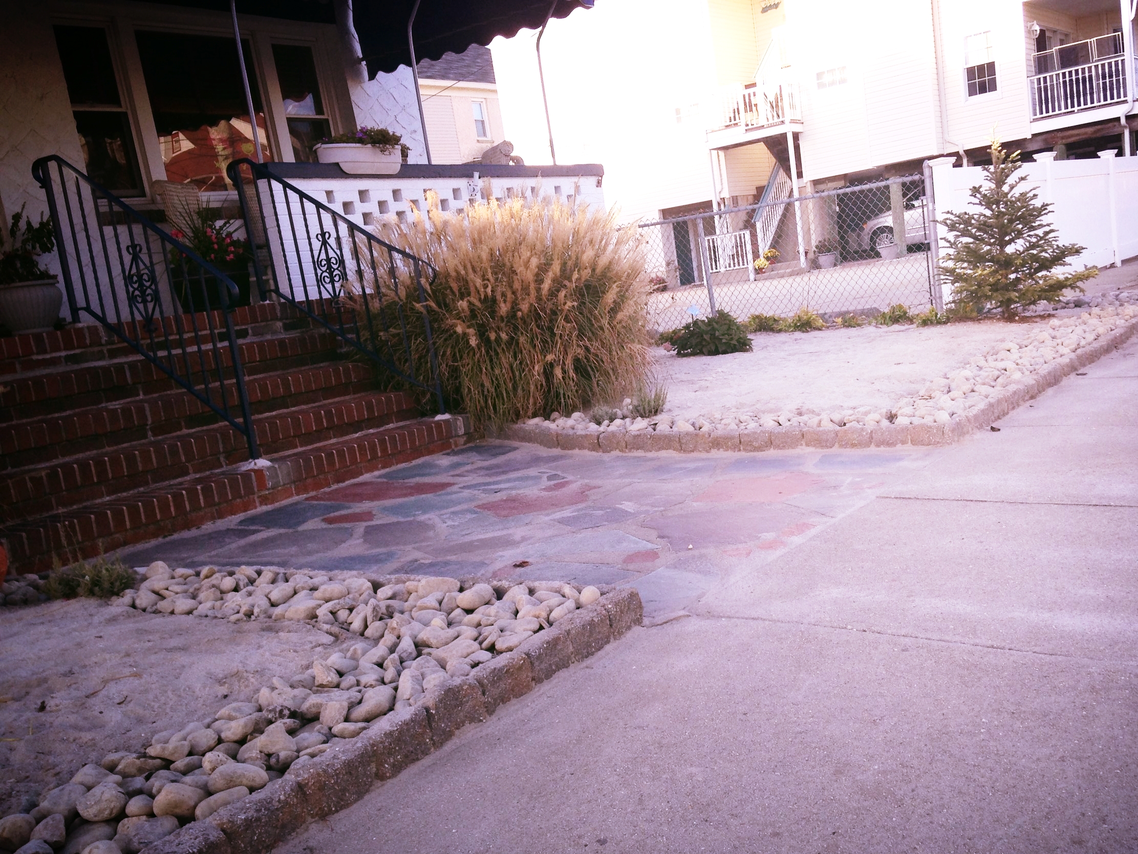  xeriscaping with sand and rock drainage system&nbsp; 