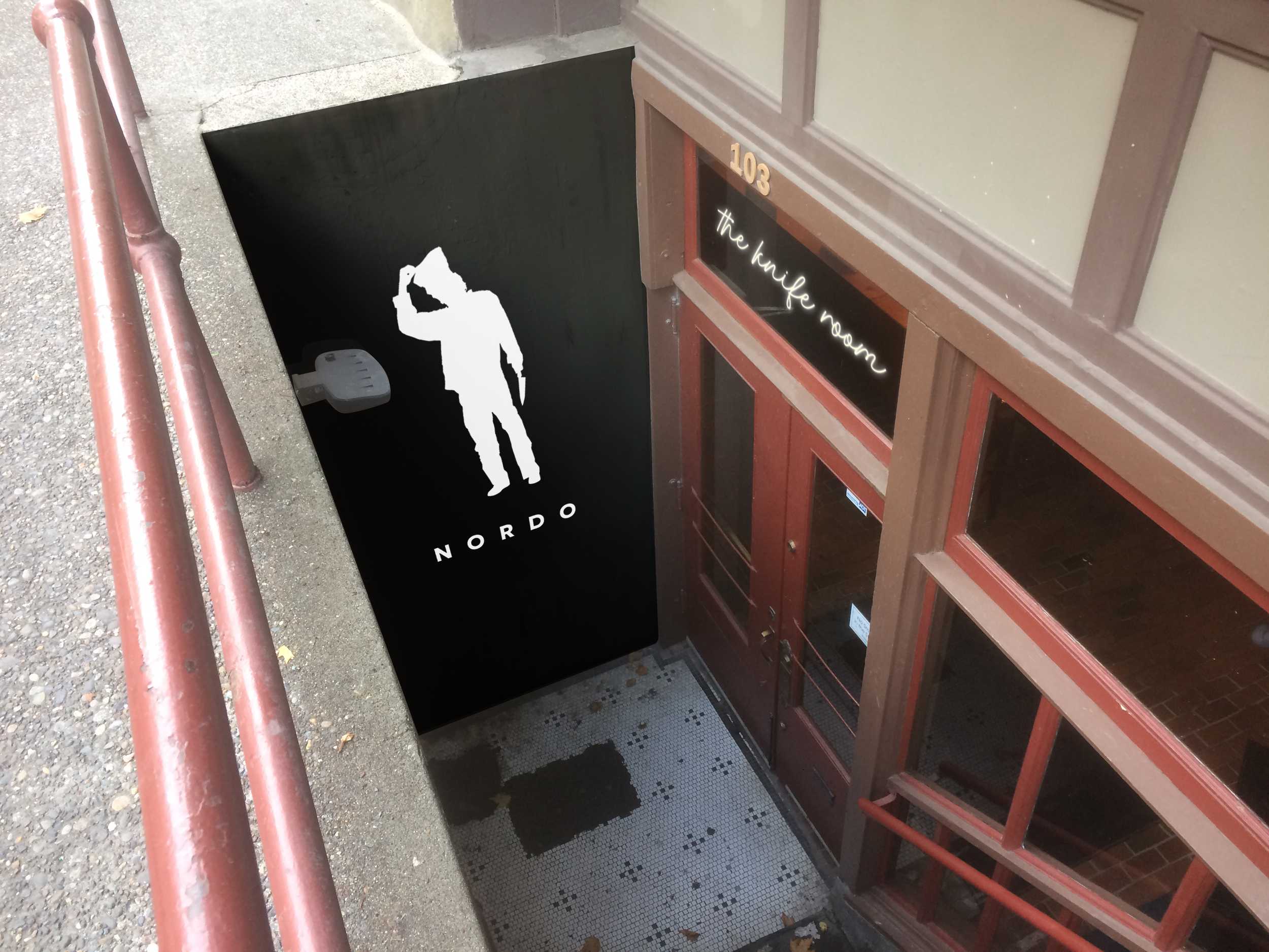 KnifeRoomSignageBottomStairs_withSignage.png