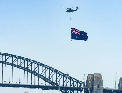 Navy Helicopter flag display at Sydney Harbour