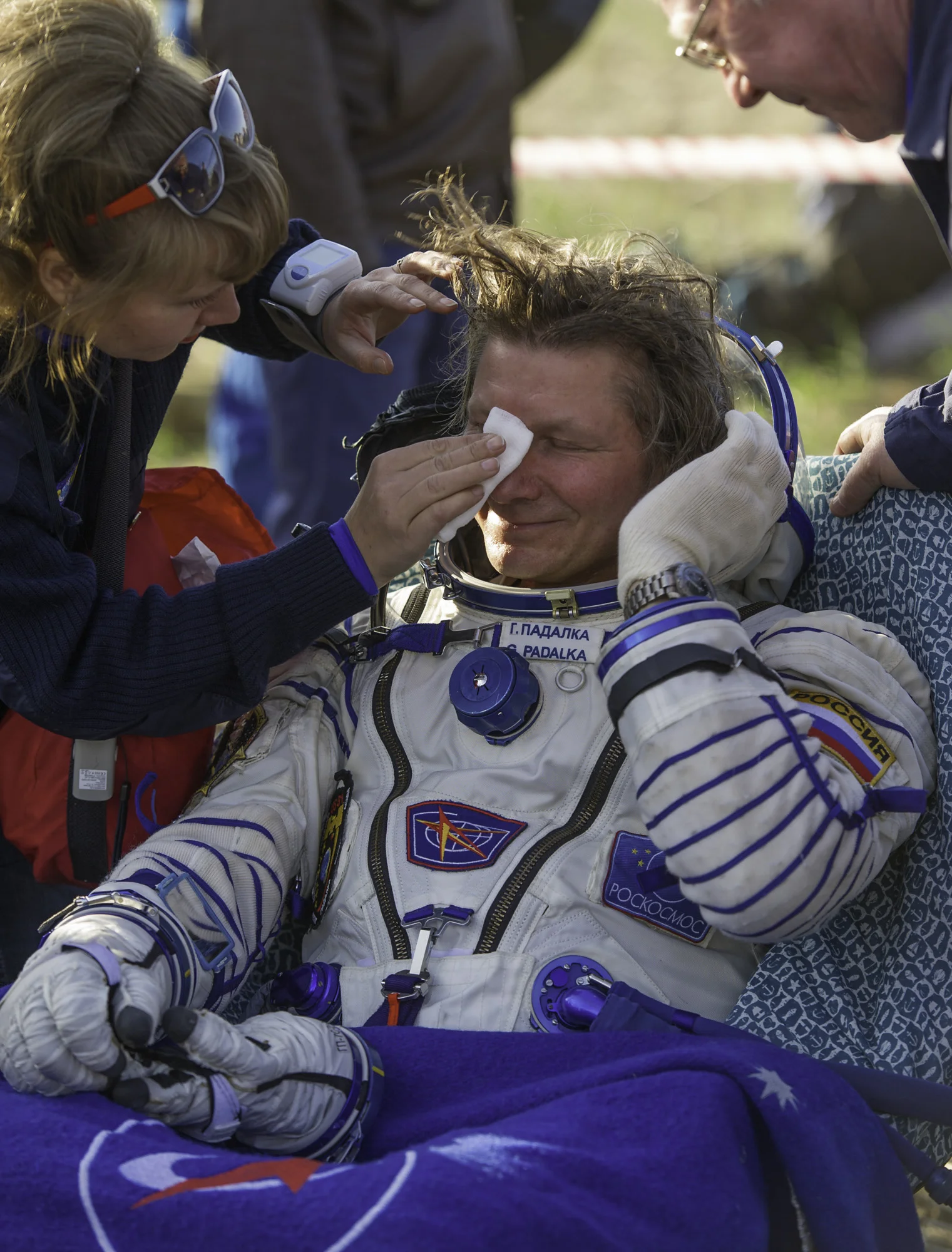 Expedition 32 Commander Gennady Padalka is attended to by crew support personnel following his landing in the Soyuz TMA-04M spacecraft, Monday, Sept. 17, 2012. Acaba and NASA Flight Engineer Joe Acaba and Russian Flight Engineer Revin are returning from five months onboard the International Space Station where they served as members of the Expedition 31 and 32 crews. (NASA/Carla Cioffi)