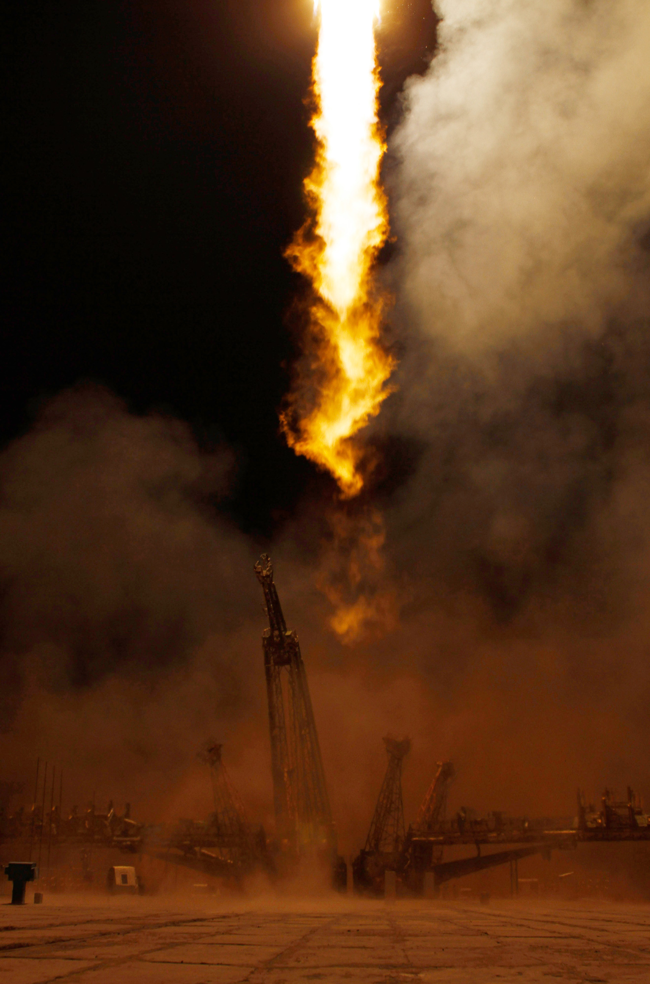  The Soyuz TMA-01M rocket launches from the Baikonur Cosmodrome in Kazakhstan on Friday, Oct. 8, 2010 carrying Expedition 25 Soyuz Commander Alexander Kaleri of Russia, NASA Flight Engineer Scott J. Kelly and Russian Flight Engineer Oleg Skripochka t