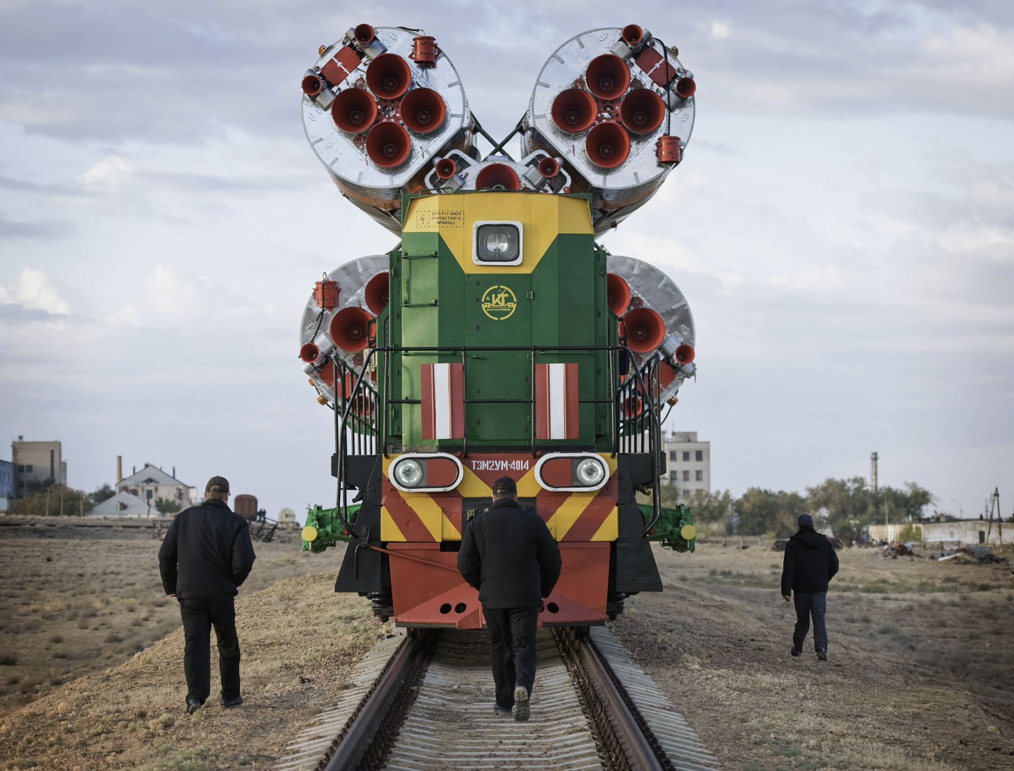  The Soyuz TMA-01M spacecraft is rolled out by train to the launch pad at the Baikonur Cosmodrome, Kazakhstan, Tuesday, Oct. 5, 2010. The TMA-01M is a new modified Soyuz vehicle that features upgraded avionics and a digital cockpit display. The crew 