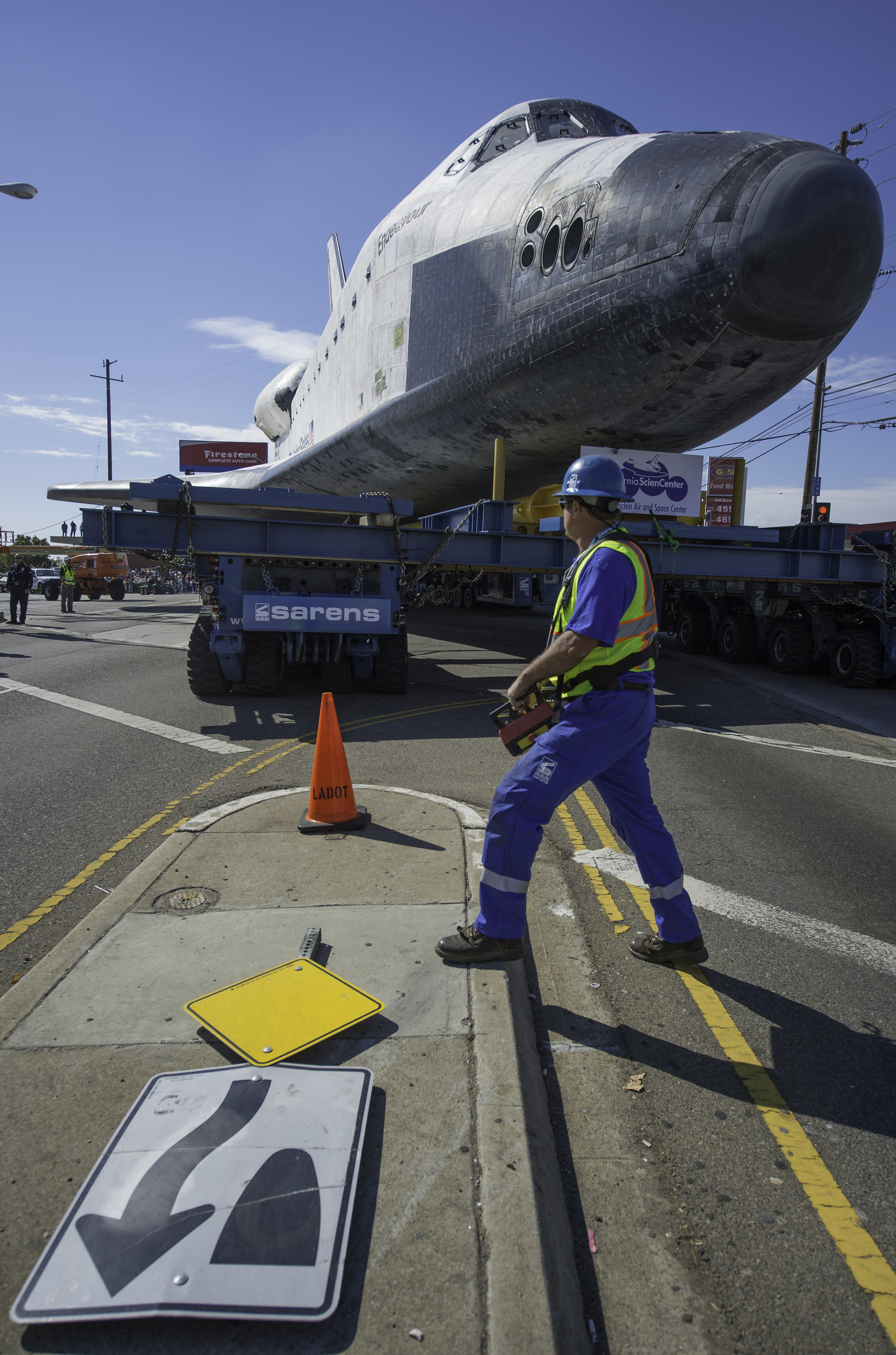 The driver of the Over Land Transporter (OLT) is seen as he maneuvers the space shuttle Endeavour on the streets of Los Angeles as it heads to its new home at the California Science Center, Friday, Oct. 12, 2012. Endeavour, built as a replacement fo
