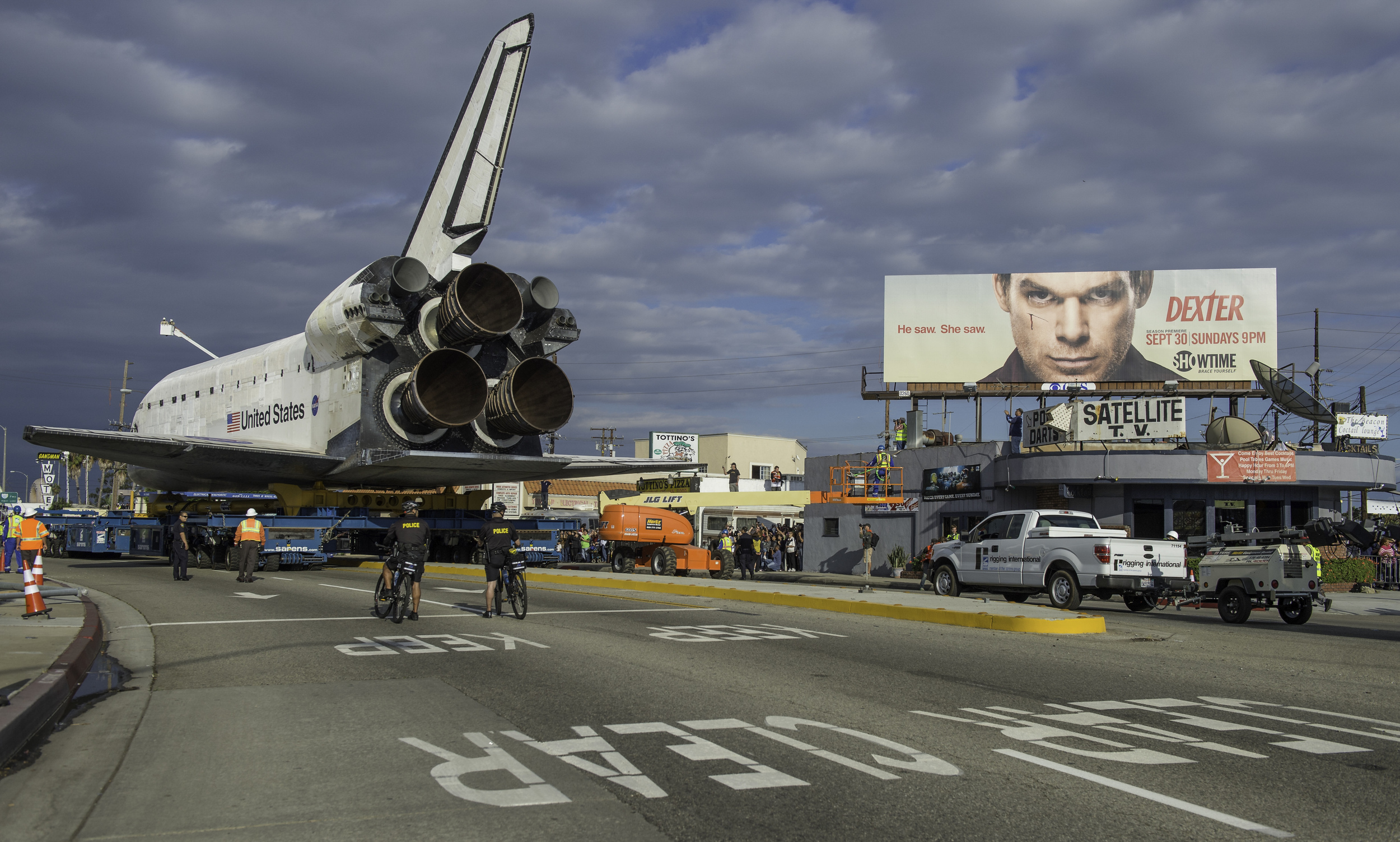  The space shuttle Endeavour is seen as it traverses through Inglewood, California on Friday, Oct. 12, 2012. Endeavour, built as a replacement for space shuttle Challenger, completed 25 missions, spent 299 days in orbit, and orbited Earth 4,671 times