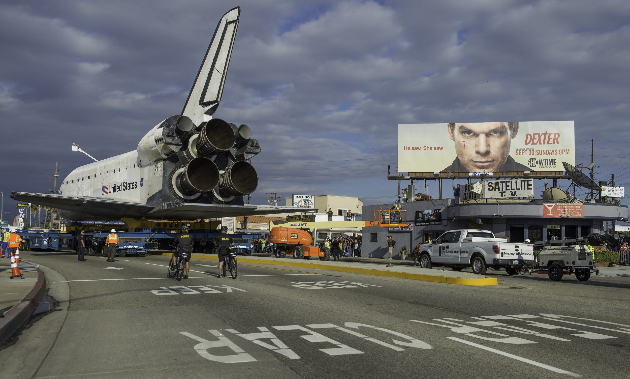 The space shuttle Endeavour is seen as it traverses through Inglewood, California on Friday, Oct. 12, 2012. Endeavour, built as a replacement for space shuttle Challenger, completed 25 missions, spent 299 days in orbit, and orbited Earth 4,671 times