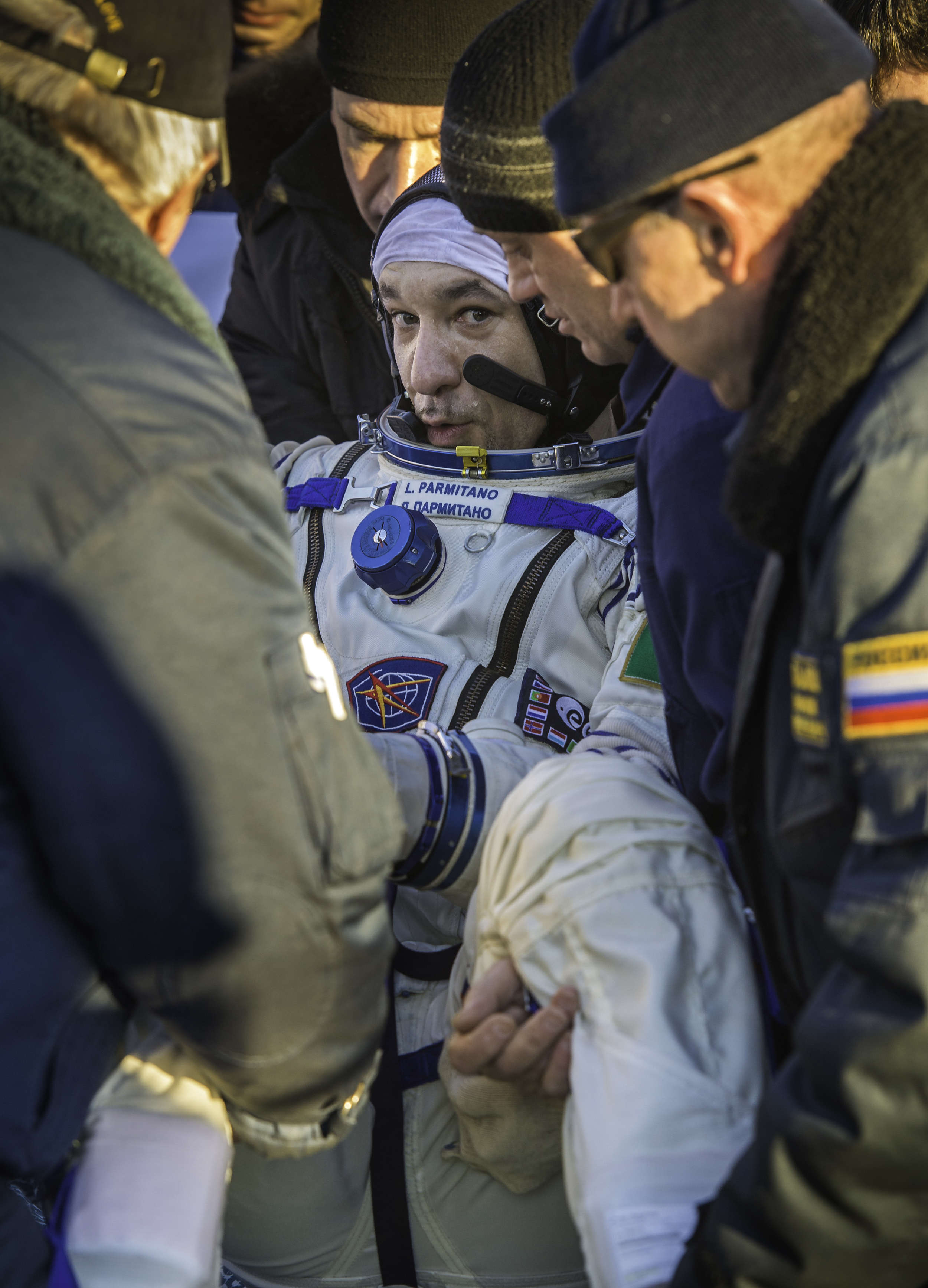  Expedition 37 Luca Parmitano of ESA (European Space Agency) is carried from the Soyuz TMA-09M spacecraft minutes after he landed in a remote area outside the town of Zhezkazgan, Kazakhstan, on Monday, Nov. 11, 2013. Parmitano, Expedition 37 Commande