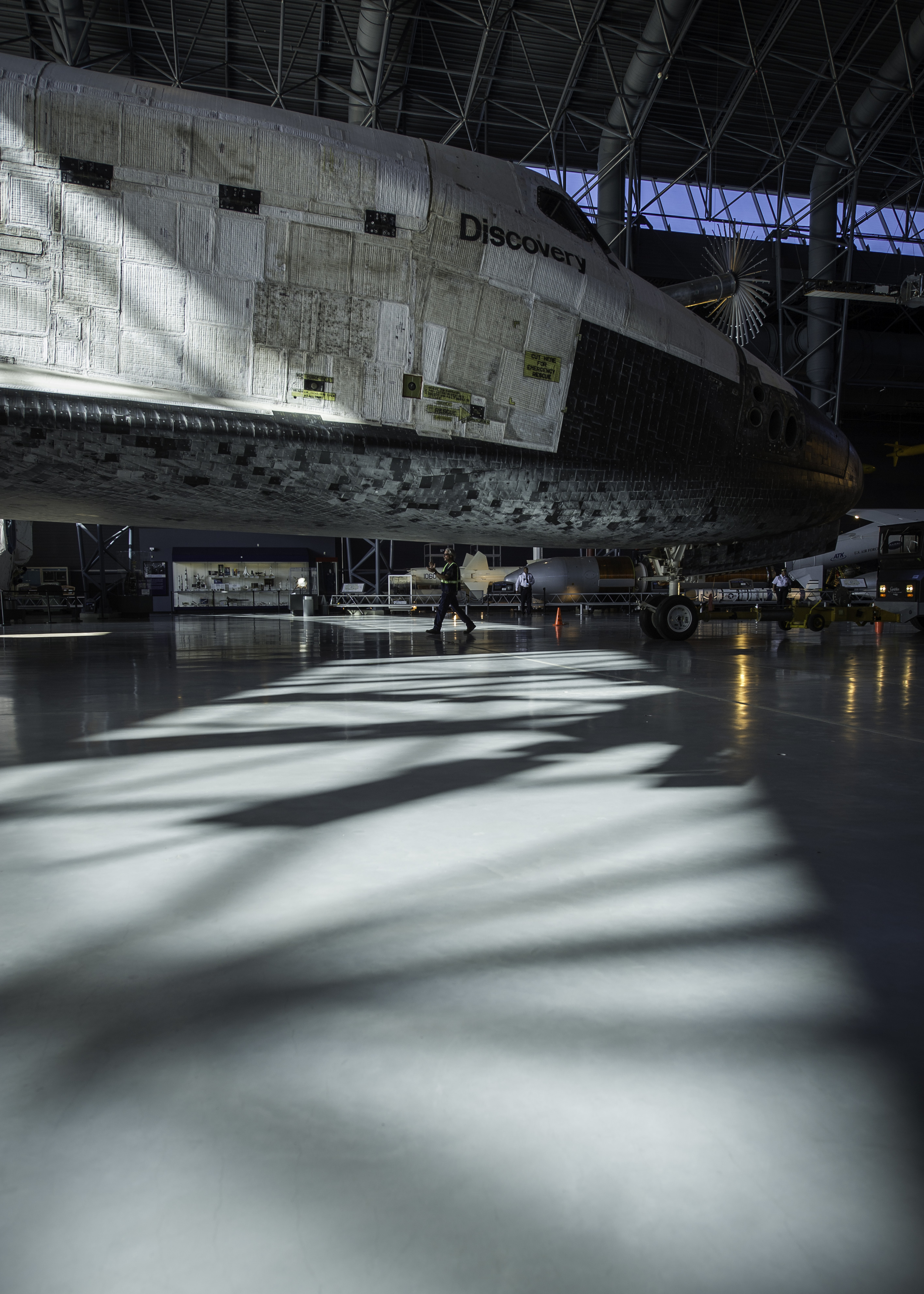  Space shuttle Discovery is rolled into its hangar at the Steven F. Udvar-Hazy Center Thursday, April 19, 2012 in Chantilly, Va. Discovery will be permanently housed at the Udvar-Hazy Center, part of the Smithsonian Institution’s Air and Space Museum