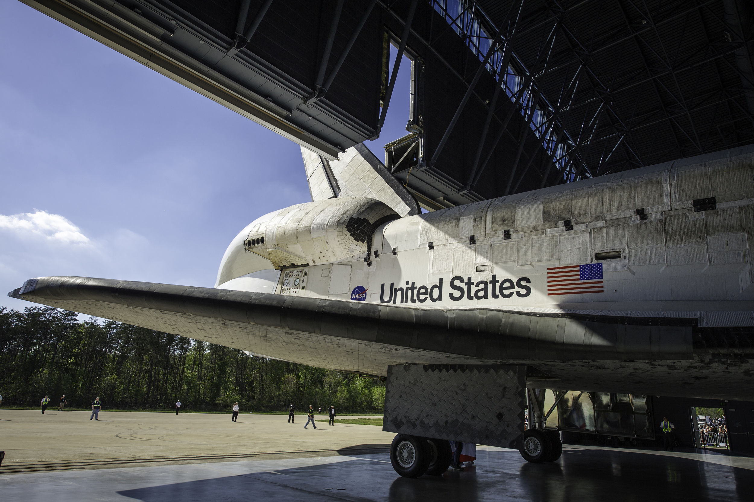  Space shuttle Discovery is rolled into its hangar at the Steven F. Udvar-Hazy Center Thursday, April 19, 2012 in Chantilly, Va. Discovery will be permanently housed at the Udvar-Hazy Center, part of the Smithsonian Institution’s Air and Space Museum