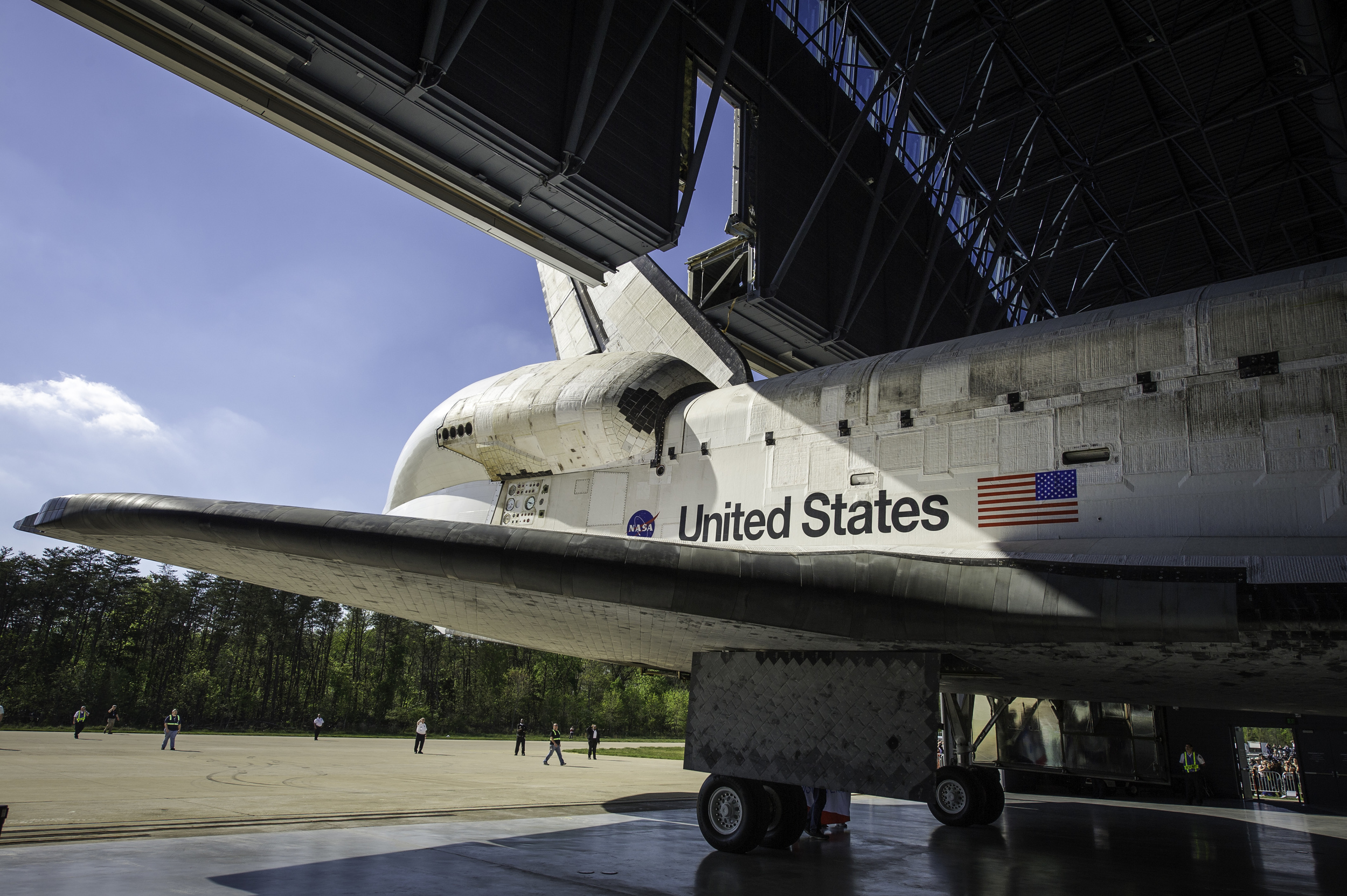 Space shuttle Discovery is rolled into its hangar at the Steven F. Udvar-Hazy Center Thursday, April 19, 2012 in Chantilly, Va. Discovery will be permanently housed at the Udvar-Hazy Center, part of the Smithsonian Institution’s Air and Space Museum