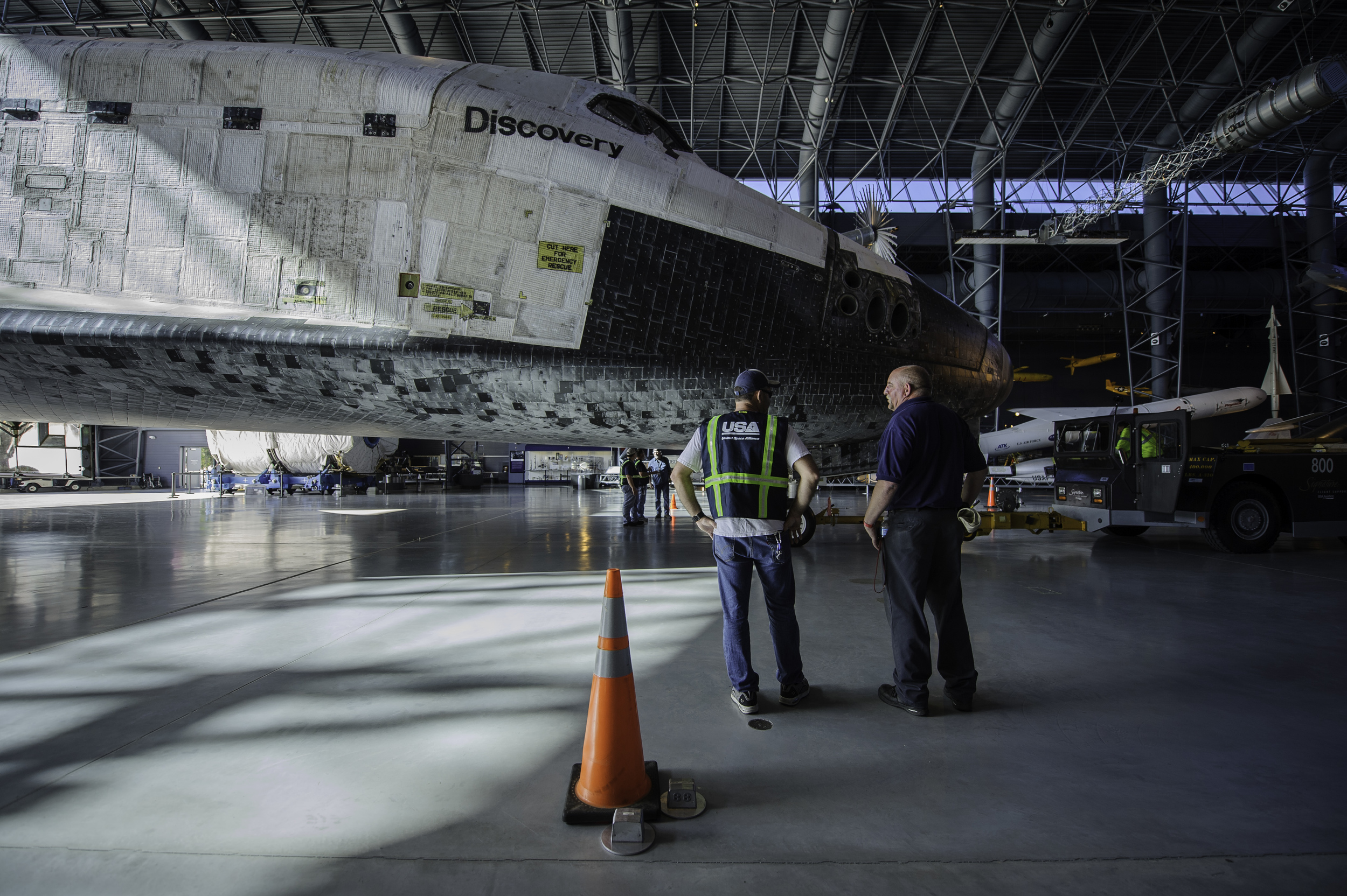  Space shuttle Discovery is rolled into its hangar at the Steven F. Udvar-Hazy Center Thursday, April 19, 2012 in Chantilly, Va. Discovery will be permanently housed at the Udvar-Hazy Center, part of the Smithsonian Institution’s Air and Space Museum