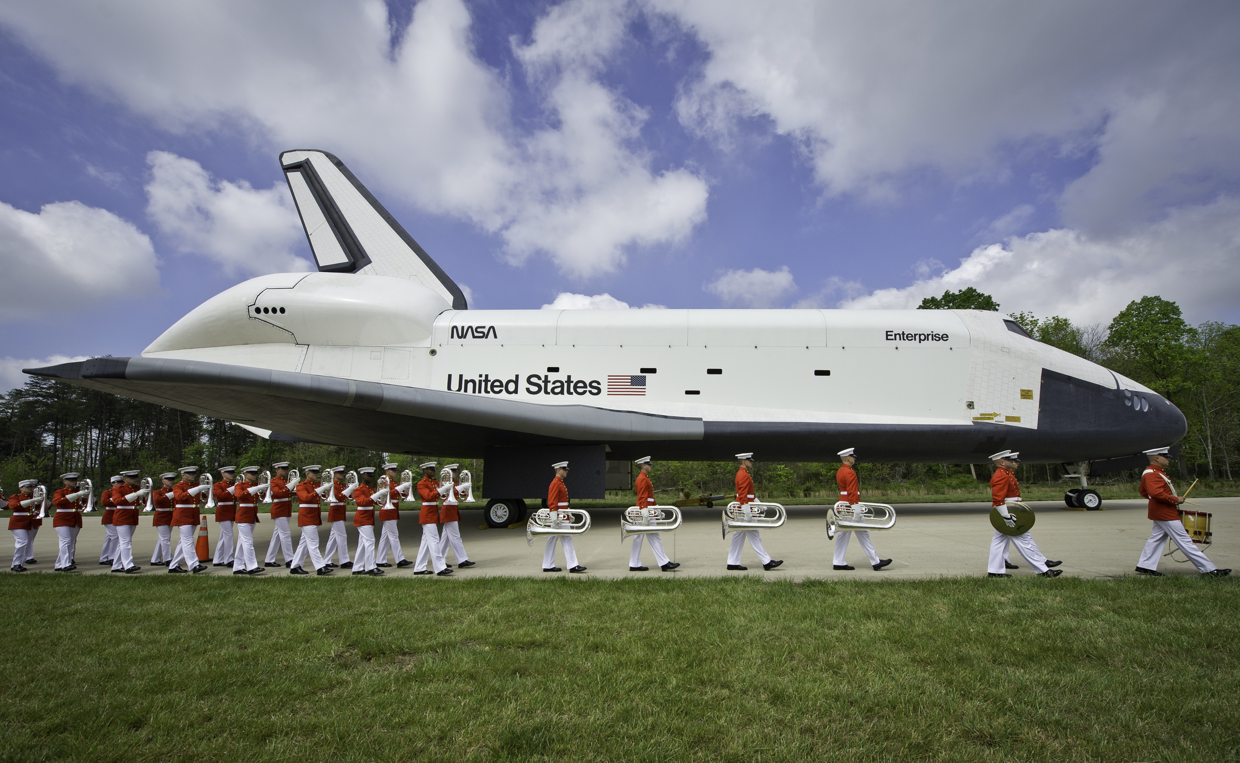  Space shuttle Enterprise is seen as the United States Marine Corp Drum and Bugle Corps and Color Guard march by at the Steven F. Udvar-Hazy Center Thursday, April 19, 2012 in Chantilly, Va. Enterprise was the first space shuttle orbiter, built for N