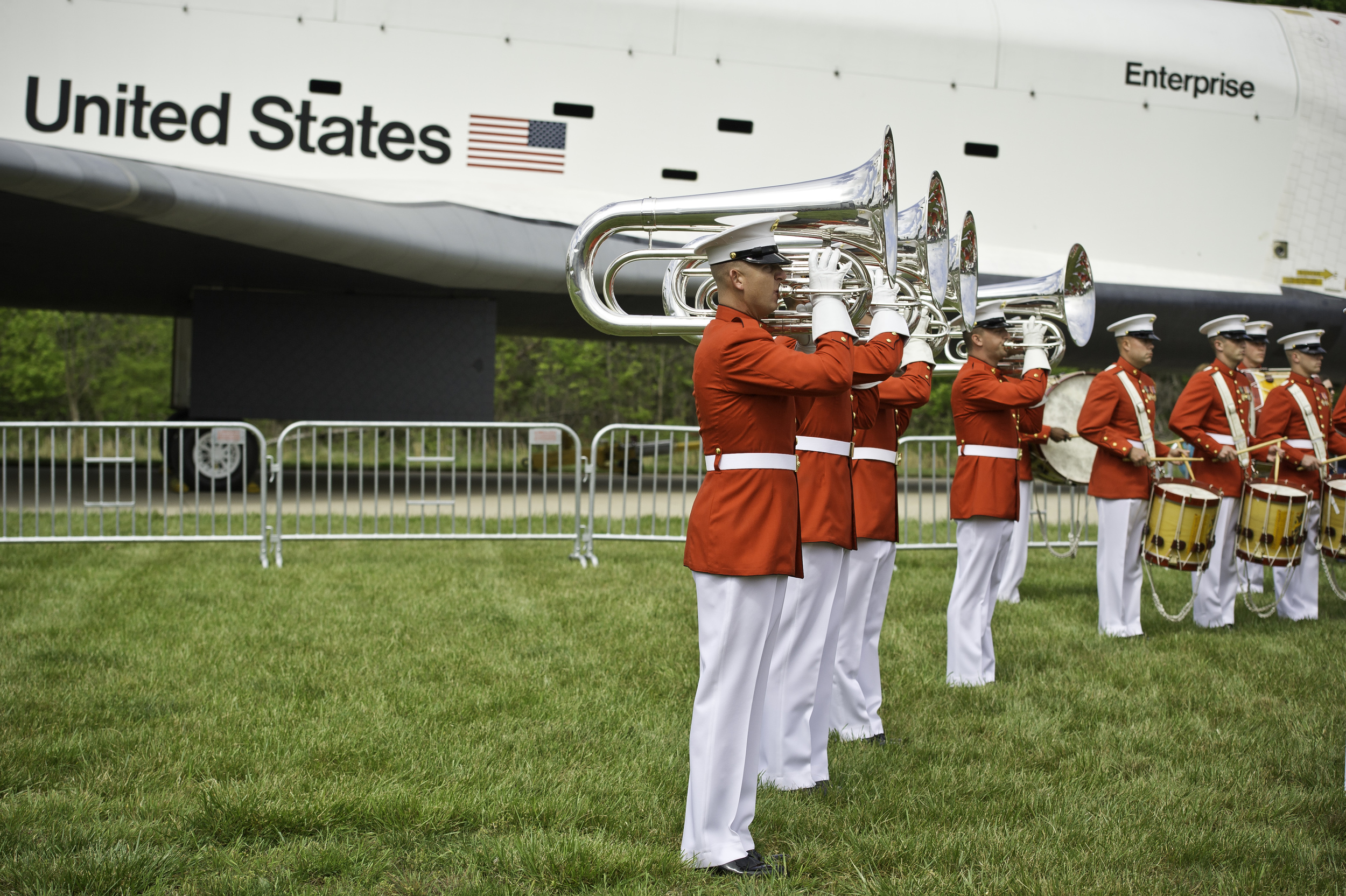 Space shuttle Enterprise is seen with the United States Marine Corp Drum and Bugle Corps and Color Guard at the Steven F. Udvar-Hazy Center Thursday, April 19, 2012 in Chantilly, Va. Enterprise was the first space shuttle orbiter, built for NASA to