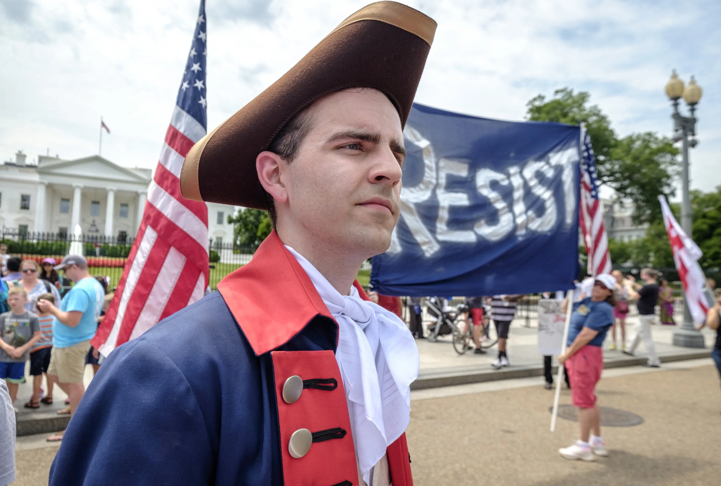 Ross, of the Washington, DC area, is seen at the July 4th White House Flash Mob in front of the White House on Tuesday, July 4, 2017. He had the following to share when asked why he took part in this event, “I feel very strongly about the presidency being degraded by Donald Trump. He’s putting not just any political party, affiliation, or any particular group of people at risk, but he is, it’s everyone. All Americans should be concerned about the way things are headed. Just the un-presidential nature of his administration and… I could go on. You can look up what he’s done. Everyone knows. So, yeah, that’s why I’m here. And it’s Independence Day, so I thought it was an appropriate time to be out here.” Participants in the July 4th Flash Mob sang “Do You Hear The People Sing” from Les Miserable as a reminder to Trump that every day the resistance grows stronger, and that the people demand his impeachment.