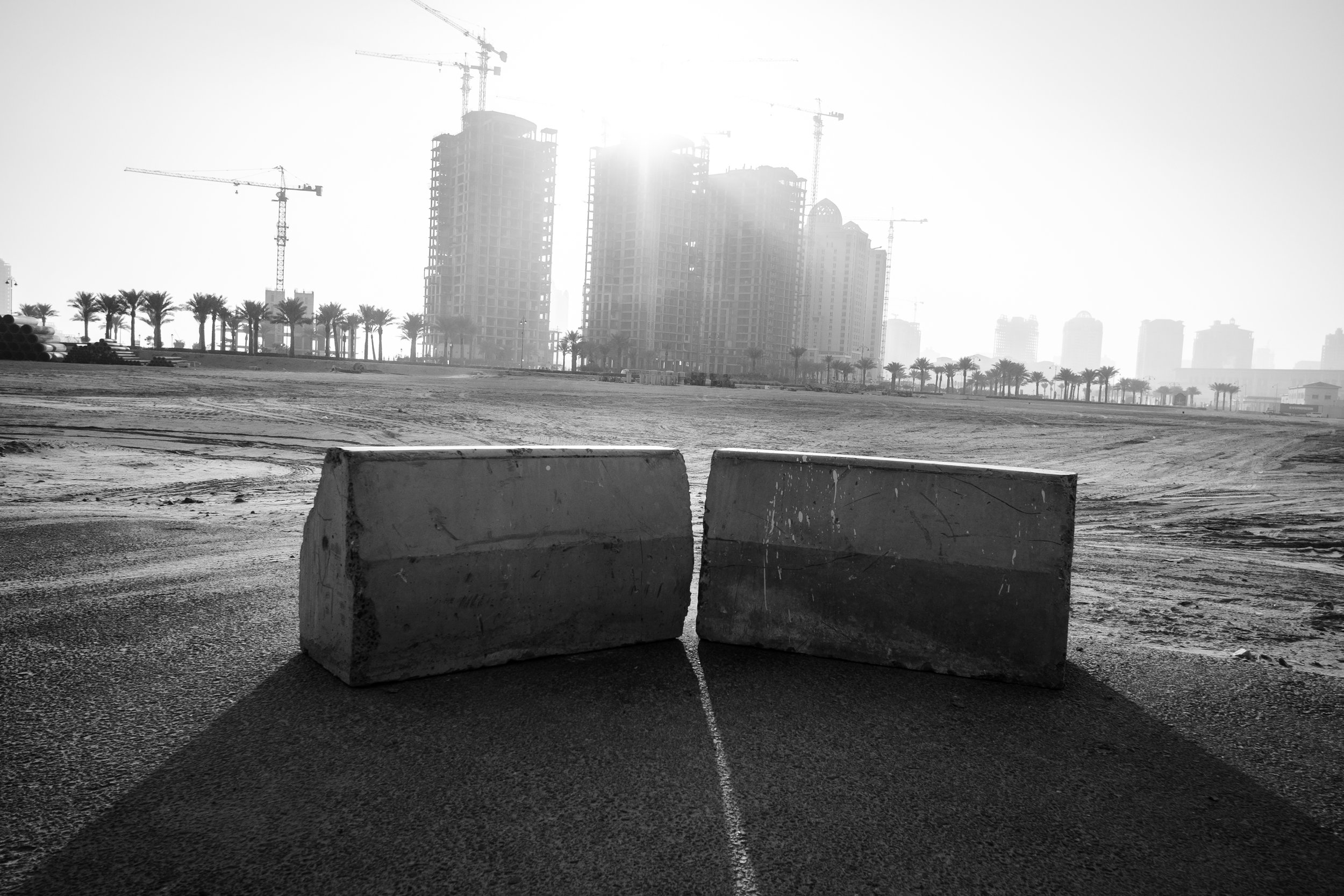  A construction scene on The Pearl with the Viva Bahriya Towers residential development in the background. The Pearl is an artificial island comprising of luxury residential estates and businesses. It is the first land in Qatar made available for own