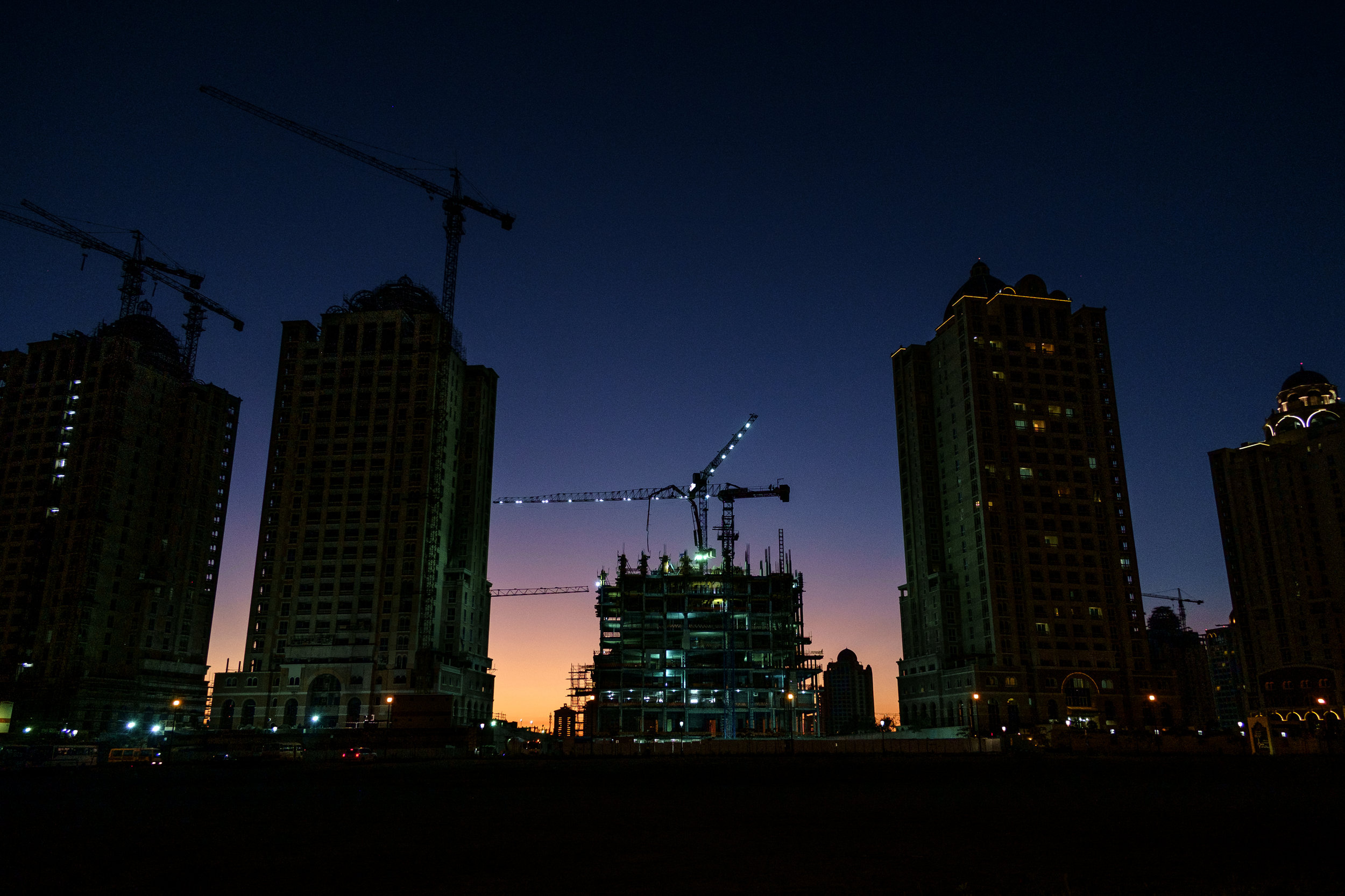  Construction of a residential tower at the Viva Bahriya development on The Pearl is seen in the evening. The Pearl is an artificial island comprising of luxury residential estates and businesses. It is the first land in Qatar made available for owne