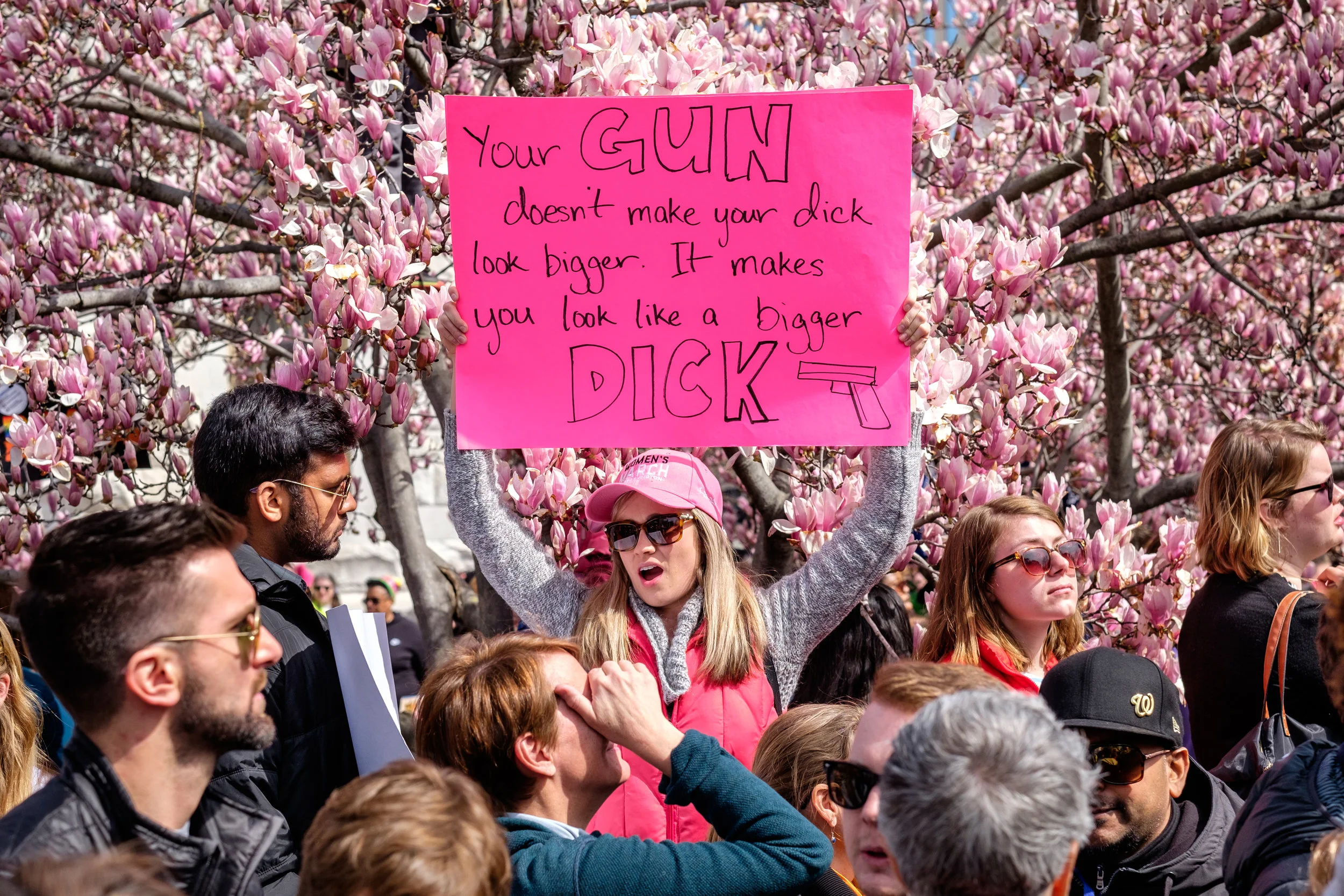 Serena Williams, originally from Seattle, WA but now living in the District, is seen with her poster at the March for Our Lives Rally on Saturday, March 24, 2018. She had this to say, “I’m here because this has always been something very important to me. My dad is actually from England, and I work in International Affairs and it’s just completely unfathomable to me the way that this country cannot wake. And to see something that is so… it should be so clear. It should be easier than this. And I’m not optimistic for change at the same time. I think we have a duty to be here, and to make our voices heard. So that’s why I’m here.” March For Our Lives is a student-led movement to end gun violence in the United States. Hundreds of thousands of people took to the streets of Washington, DC to demand that peoples’ lives and safety become a priority and to put an end to gun violence in communities and schools immediately. Over 800 sibling marches took place across the U.S. and internationally.