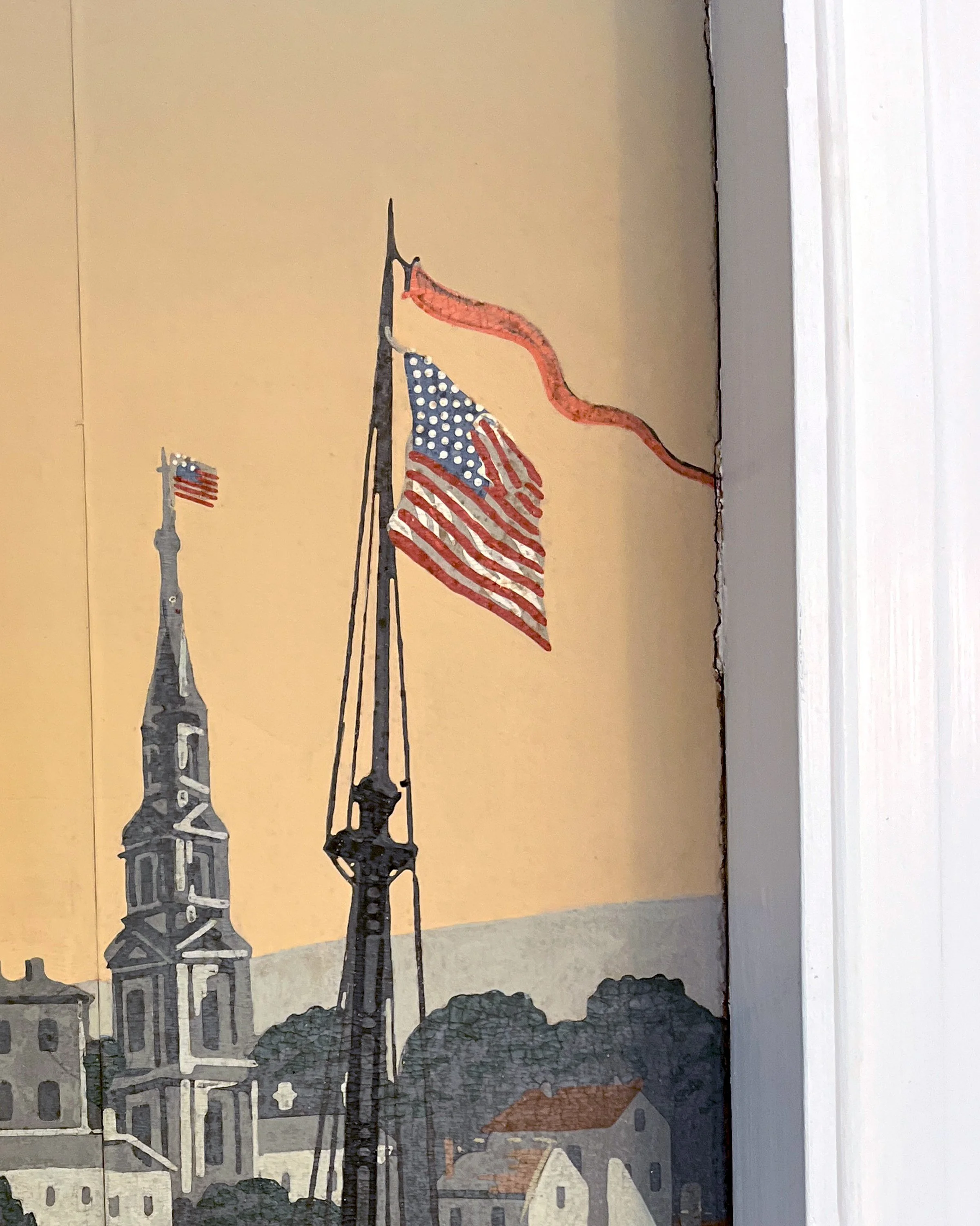 Close-up of age-related spotting on antique wallpaper after restoration